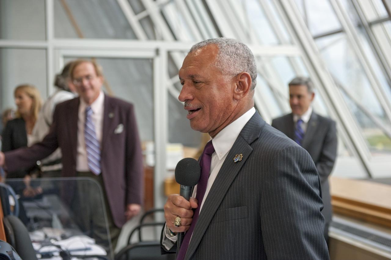 CAPE CANAVERAL, Fla. - NASA Administrator Charlie Bolden congratulates the launch team in Firing Room 4 of the Launch Control Center at NASA's Kennedy Space Center in Florida following the successful launch of space shuttle Endeavour. The shuttle lifted off on its STS-134 mission to the International Space Station on time at 8:56 a.m. EDT on May 16.    The shuttle and its six-member crew are embarking on a mission to deliver the Alpha Magnetic Spectrometer-2 (AMS), Express Logistics Carrier-3, a high-pressure gas tank and additional spare parts for the Dextre robotic helper to the space station. Endeavour's first launch attempt on April 29 was scrubbed because of an issue associated with a faulty power distribution box called the aft load control assembly-2 (ALCA-2). For more information visit, www.nasa.gov/mission_pages/shuttle/shuttlemissions/sts134/index.html. Photo credit: NASA/Kim Shiflett