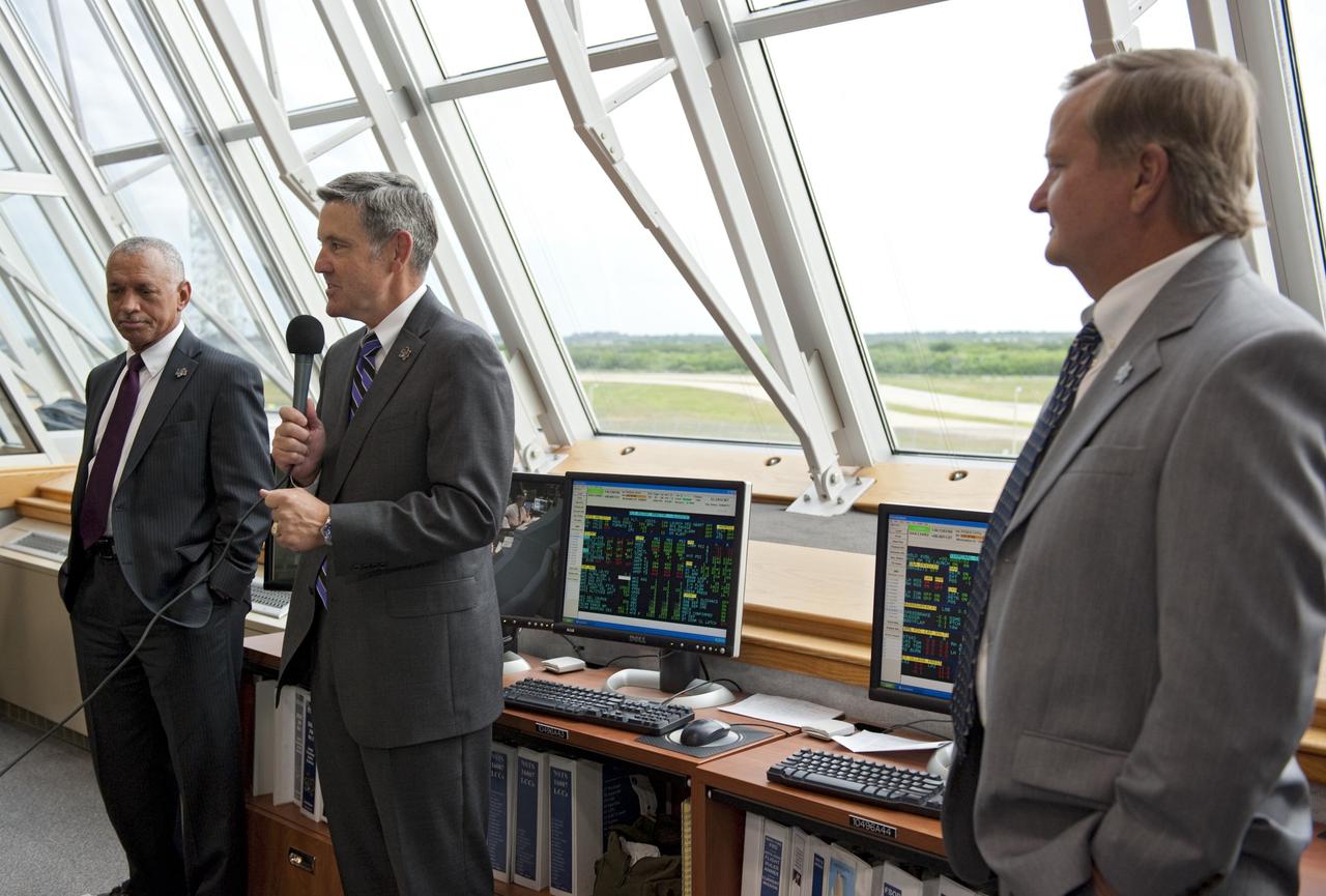 CAPE CANAVERAL, Fla. - NASA Kennedy Space Center Director Bob Cabana congratulates the launch team in Firing Room 4 of the Launch Control Center following the successful launch of space shuttle Endeavour. To Cabana's left is NASA Administrator Charlie Bolden and to his right is Shuttle Launch Director Mike Leinbach. The shuttle lifted off on its STS-134 mission to the International Space Station on time at 8:56 a.m. EDT on May 16.    The shuttle and its six-member crew are embarking on a mission to deliver the Alpha Magnetic Spectrometer-2 (AMS), Express Logistics Carrier-3, a high-pressure gas tank and additional spare parts for the Dextre robotic helper to the space station. Endeavour's first launch attempt on April 29 was scrubbed because of an issue associated with a faulty power distribution box called the aft load control assembly-2 (ALCA-2). For more information visit, www.nasa.gov/mission_pages/shuttle/shuttlemissions/sts134/index.html. Photo credit: NASA/Kim Shiflett