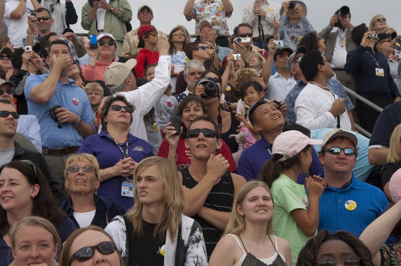 CAPE CANAVERAL, Fla. - Spectators at the Banana Creek Viewing Site near the Saturn V Center at NASA's Kennedy Space Center in Florida watch as space shuttle Endeavour soars skyward. The shuttle lifted off on its STS-134 mission to the International Space Station on time at 8:56 a.m. EDT on May 16.    The shuttle and its six-member crew are embarking on a mission to deliver the Alpha Magnetic Spectrometer-2 (AMS), Express Logistics Carrier-3, a high-pressure gas tank and additional spare parts for the Dextre robotic helper to the space station. Endeavour's first launch attempt on April 29 was scrubbed because of an issue associated with a faulty power distribution box called the aft load control assembly-2 (ALCA-2). For more information, visit www.nasa.gov/mission_pages/shuttle/shuttlemissions/sts134/index.html. Photo credit: NASA/Chad Baumer
