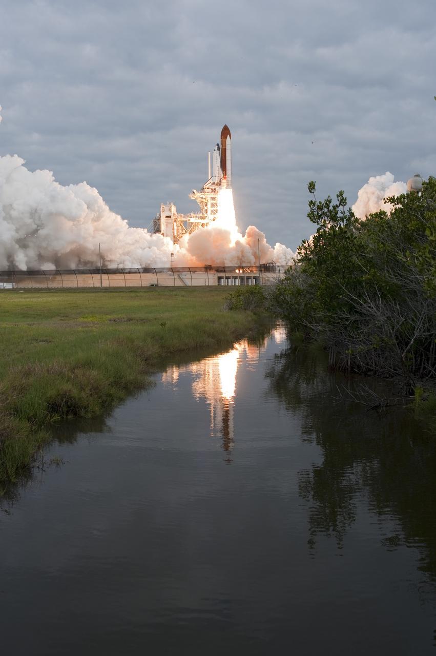 CAPE CANAVERAL, Fla. -- Amid the tranquility of a wildlife refuge, space shuttle Endeavour rumbles off Launch Pad 39A at NASA's Kennedy Space Center in Florida. Endeavour began its final flight, the STS-134 mission, to the International Space Station on time at 8:56 a.m. EDT on May 16.        Endeavour and its six-member crew are embarking on a mission to deliver the Alpha Magnetic Spectrometer-2 (AMS), Express Logistics Carrier-3, a high-pressure gas tank and additional spare parts for the Dextre robotic helper to the space station. Endeavour's first launch attempt on April 29 was scrubbed because of an issue associated with a faulty power distribution box called the aft load control assembly-2 (ALCA-2). For more information visit, www.nasa.gov/mission_pages/shuttle/shuttlemissions/sts134/index.html. Kennedy coexists with the Merritt Island National Wildlife Refuge, habitat to more than 310 species of birds, 25 mammals, 117 fish and 65 amphibians and reptiles. Photo credit: NASA/Tony Gray and Tom Farrar