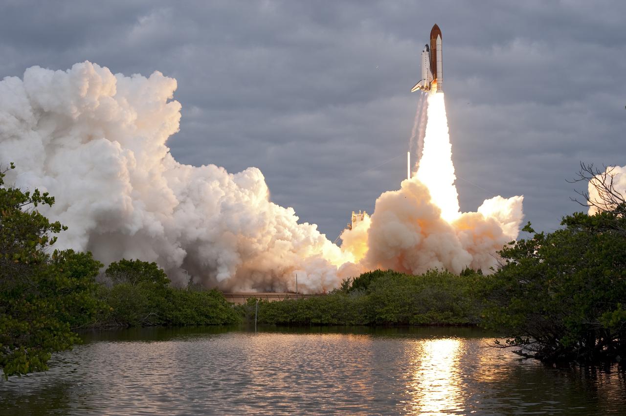 CAPE CANAVERAL, Fla. -- Amid the tranquility of a wildlife refuge, space shuttle Endeavour rumbles off Launch Pad 39A at NASA's Kennedy Space Center in Florida. Endeavour began its final flight, the STS-134 mission, to the International Space Station on time at 8:56 a.m. EDT on May 16.        Endeavour and its six-member crew are embarking on a mission to deliver the Alpha Magnetic Spectrometer-2 (AMS), Express Logistics Carrier-3, a high-pressure gas tank and additional spare parts for the Dextre robotic helper to the space station. Endeavour's first launch attempt on April 29 was scrubbed because of an issue associated with a faulty power distribution box called the aft load control assembly-2 (ALCA-2). For more information visit, www.nasa.gov/mission_pages/shuttle/shuttlemissions/sts134/index.html. Kennedy coexists with the Merritt Island National Wildlife Refuge, habitat to more than 310 species of birds, 25 mammals, 117 fish and 65 amphibians and reptiles. Photo credit: NASA/Sandra Joseph and Kevin O'Connell