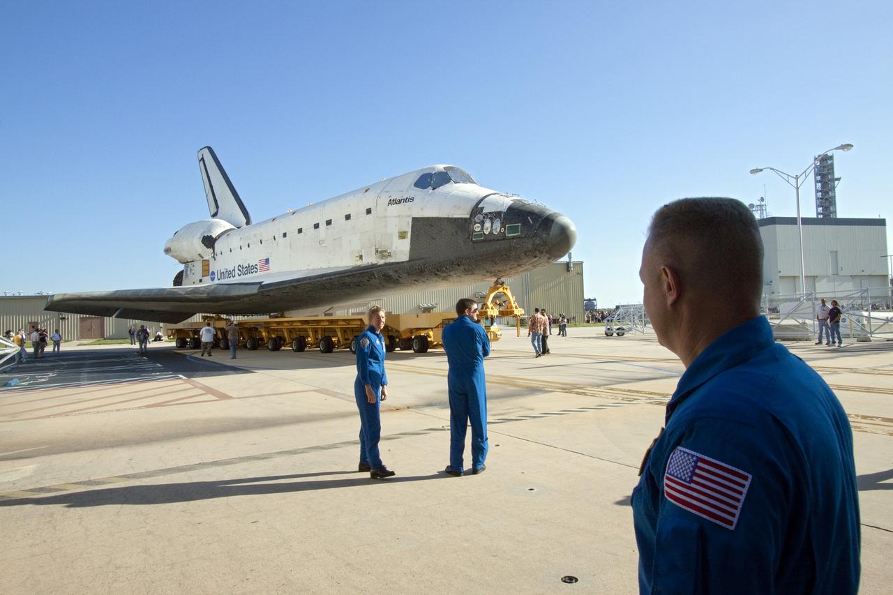 CAPE CANAVERAL, Fla. -- Shuttle Atlantis makes its final planned move from Orbiter Processing Facility-1 to the Vehicle Assembly Building at NASA's Kennedy Space Center in Florida. The move called "rollover" is a major milestone in processing for the STS-135 mission to the International Space Station. Inside the VAB, the shuttle will be attached to its external fuel tank and solid rocket boosters. Commander Chris Ferguson, Pilot Doug Hurley and Mission Specialists Sandra Magnus and Rex Walheim are targeted to launch in early July, taking with them the Raffaello multipurpose logistics module packed with supplies, logistics and spare parts. The STS-135 mission also will fly a system to investigate the potential for robotically refueling existing spacecraft and return a failed ammonia pump module to help NASA better understand the failure mechanism and improve pump designs for future systems.        STS-135 will be the 33rd flight of Atlantis, the 37th shuttle mission to the space station, and the 135th and final mission of NASA's Space Shuttle Program. For more information visit, www.nasa.gov/mission_pages/shuttle/shuttlemissions/sts135/index.html. Photo credit: NASA/Jack Pfaller