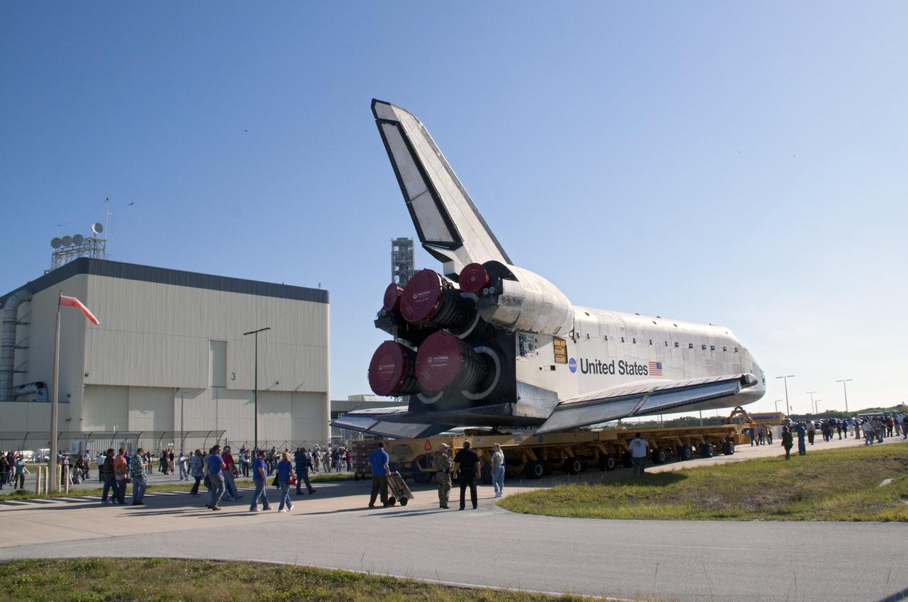 CAPE CANAVERAL, Fla. -- Shuttle Atlantis makes its final planned move from Orbiter Processing Facility-1 to the Vehicle Assembly Building at NASA's Kennedy Space Center in Florida. The move called "rollover" is a major milestone in processing for the STS-135 mission to the International Space Station. Inside the VAB, the shuttle will be attached to its external fuel tank and solid rocket boosters. Commander Chris Ferguson, Pilot Doug Hurley and Mission Specialists Sandra Magnus and Rex Walheim are targeted to launch in early July, taking with them the Raffaello multipurpose logistics module packed with supplies, logistics and spare parts. The STS-135 mission also will fly a system to investigate the potential for robotically refueling existing spacecraft and return a failed ammonia pump module to help NASA better understand the failure mechanism and improve pump designs for future systems.      STS-135 will be the 33rd flight of Atlantis, the 37th shuttle mission to the space station, and the 135th and final mission of NASA's Space Shuttle Program. For more information visit, www.nasa.gov/mission_pages/shuttle/shuttlemissions/sts135/index.html. Photo credit: NASA/Jack Pfaller