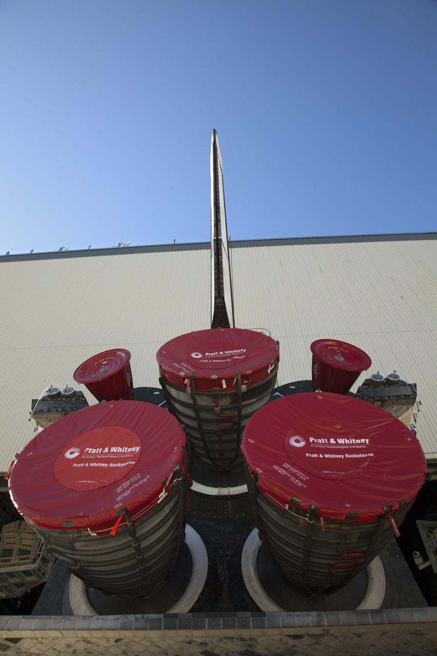 CAPE CANAVERAL, Fla. -- Shuttle Atlantis' three main engines take center stage in this image as Atlantis is being moved to the Vehicle Assembly Building (VAB) from Orbiter Processing Faciity-1 at NASA's Kennedy Space Center in Florida.      The move called "rollover" is a major milestone in processing for the STS-135 mission to the International Space Station. Inside the VAB, the shuttle will be attached to its external fuel tank and solid rocket boosters. Commander Chris Ferguson, Pilot Doug Hurley and Mission Specialists Sandra Magnus and Rex Walheim are targeted to launch in early July, taking with them the Raffaello multipurpose logistics module packed with supplies, logistics and spare parts. The STS-135 mission also will fly a system to investigate the potential for robotically refueling existing spacecraft and return a failed ammonia pump module to help NASA better understand the failure mechanism and improve pump designs for future systems. STS-135 will be the 33rd flight of Atlantis, the 37th shuttle mission to the space station, and the 135th and final mission of NASA's Space Shuttle Program. For more information visit, www.nasa.gov/mission_pages/shuttle/shuttlemissions/sts135/index.html. Photo credit: NASA/Frankie Martin