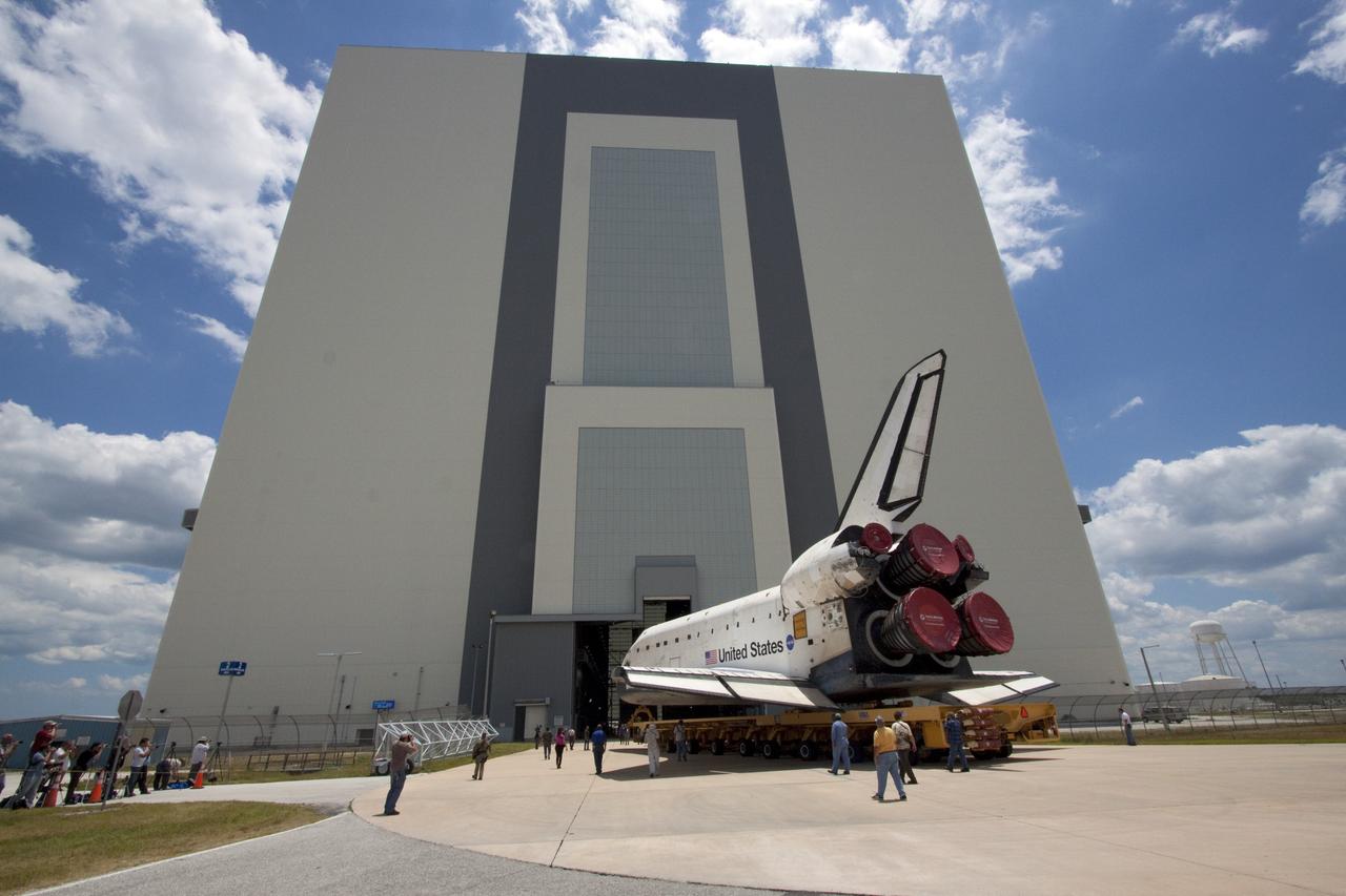 CAPE CANAVERAL, Fla. -- Shuttle Atlantis makes its final planned move, or rollover, into the Vehicle Assembly Building (VAB) from Orbiter Processing Facility-1 at NASA's Kennedy Space Center in Florida.      The move called "rollover" is a major milestone in processing for the STS-135 mission to the International Space Station. Commander Chris Ferguson, Pilot Doug Hurley and Mission Specialists Sandra Magnus and Rex Walheim are expected to launch mid July, taking with them the Raffaello multipurpose logistics module packed with supplies, logistics and spare parts. The STS-135 mission also will fly a system to investigate the potential for robotically refueling existing spacecraft and return a failed ammonia pump module to help NASA better understand the failure mechanism and improve pump designs for future systems. STS-135 will be the 33rd flight of Atlantis, the 37th shuttle mission to the space station, and the 135th and final mission of NASA's Space Shuttle Program. For more information visit, www.nasa.gov/mission_pages/shuttle/shuttlemissions/sts135/index.html. Photo credit: NASA/Jack Pfaller