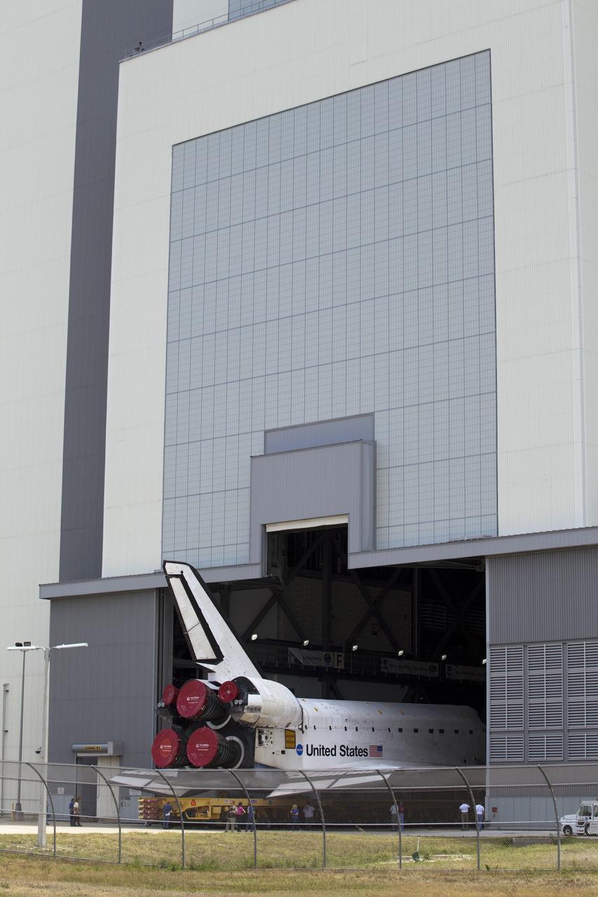 CAPE CANAVERAL, Fla. -- Shuttle Atlantis makes its final planned move, or rollover, into the Vehicle Assembly Building (VAB) from Orbiter Processing Facility-1 at NASA's Kennedy Space Center in Florida.      The move called "rollover" is a major milestone in processing for the STS-135 mission to the International Space Station. Commander Chris Ferguson, Pilot Doug Hurley and Mission Specialists Sandra Magnus and Rex Walheim are targeted to launch in early July, taking with them the Raffaello multipurpose logistics module packed with supplies, logistics and spare parts. The STS-135 mission also will fly a system to investigate the potential for robotically refueling existing spacecraft and return a failed ammonia nfor future systems. STS-135 will be the 33rd flight of Atlantis, the 37th shuttle mission to the space station, and the 135th and final mission of NASA's Space Shuttle Program. For more information visit, www.nasa.gov/mission_pages/shuttle/shuttlemissions/sts135/index.html. Photo credit: NASA/Frankie Martin