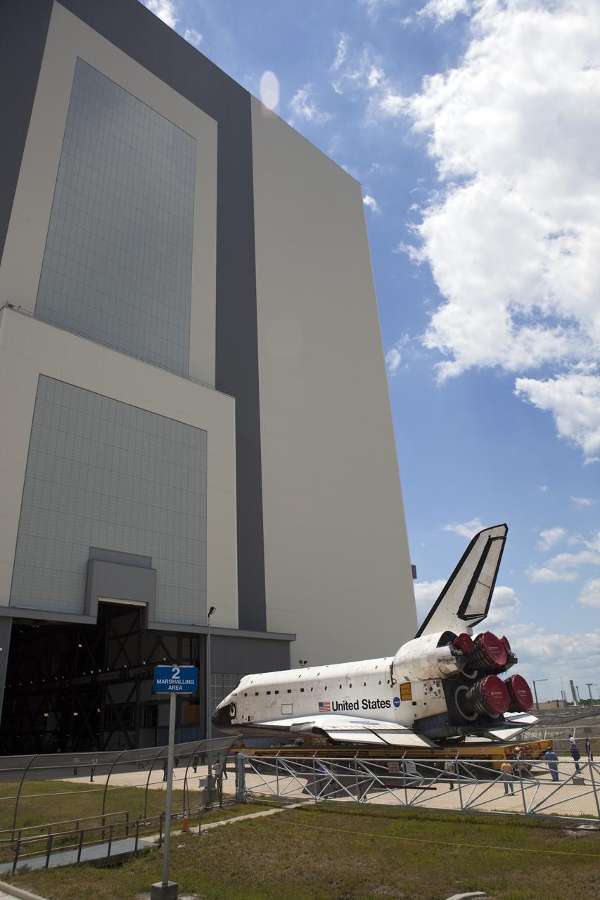 CAPE CANAVERAL, Fla. -- Shuttle Atlantis makes its final planned move, or rollover, into the Vehicle Assembly Building (VAB) from Orbiter Processing Facility-1 at NASA's Kennedy Space Center in Florida.        The move called "rollover" is a major milestone in processing for the STS-135 mission to the International Space Station. Inside the VAB, the shuttle will be attached to its external fuel tank and solid rocket boosters. Commander Chris Ferguson, Pilot Doug Hurley and Mission Specialists Sandra Magnus and Rex Walheim are targeted to launch in early July, taking with them the Raffaello multipurpose logistics module packed with supplies, logistics and spare parts. The STS-135 mission also will fly a system to investigate the potential for robotically refueling existing spacecraft and return a failed ammonia pump module to help NASA better understand the failure mechanism and improve pump designs for future systems. STS-135 will be the 33rd flight of Atlantis, the 37th shuttle mission to the space station, and the 135th and final mission of NASA's Space Shuttle Program. For more information visit, www.nasa.gov/mission_pages/shuttle/shuttlemissions/sts135/index.html. Photo credit: NASA/Dimitri Gerondidakis