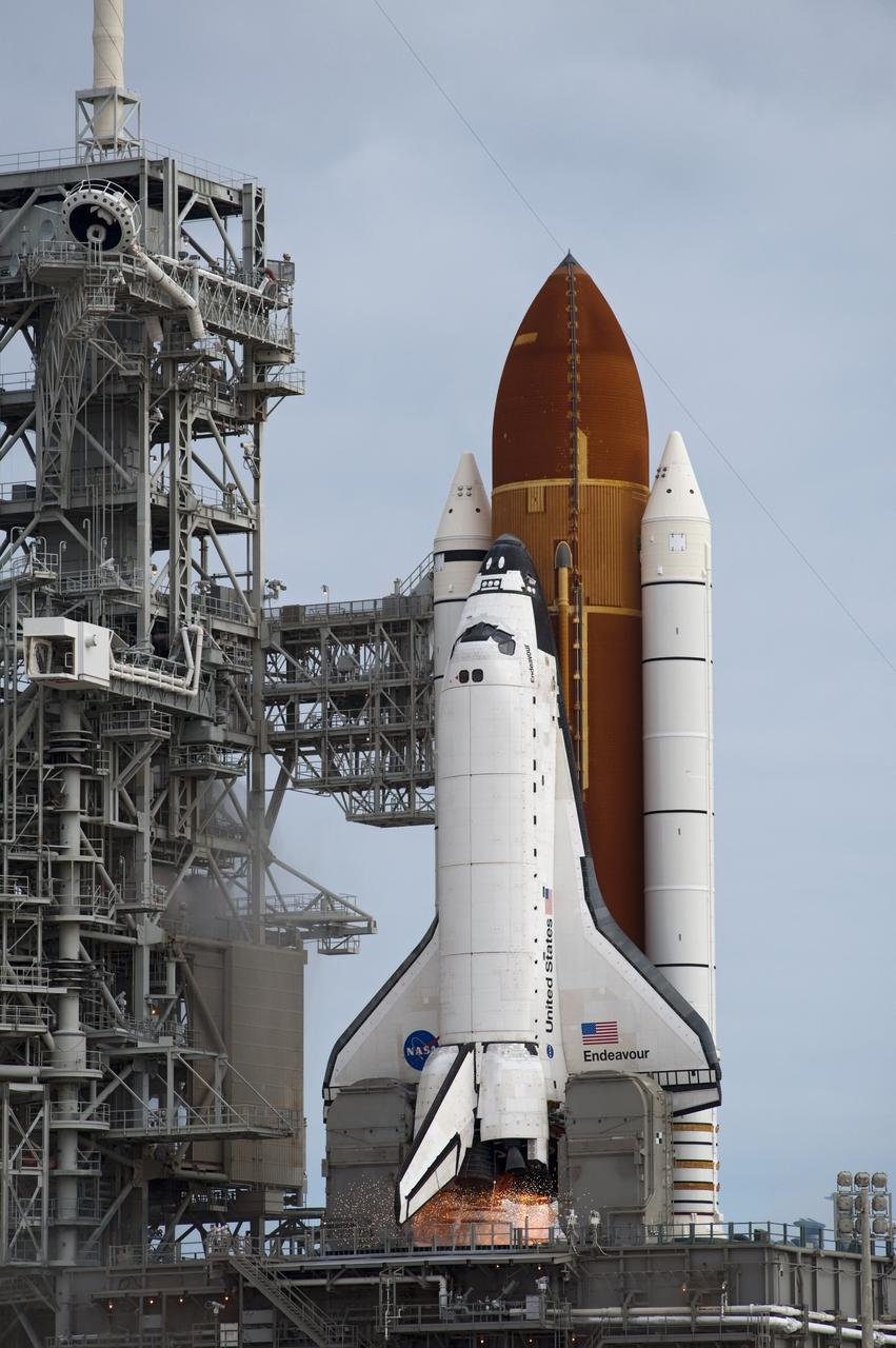 CAPE CANAVERAL, Fla. -- Space shuttle Endeavour's main engines ignite for liftoff at Launch Pad 39A at NASA's Kennedy Space Center in Florida. Endeavour began its final flight, the STS-134 mission to the International Space Station, at 8:56 a.m. EDT on May 16. Endeavour and its six-member crew will deliver the Alpha Magnetic Spectrometer-2 (AMS), Express Logistics Carrier-3, a high-pressure gas tank and additional spare parts for the Dextre robotic helper to the space station. For more information visit, www.nasa.gov/mission_pages/shuttle/shuttlemissions/sts134/index.html. Photo credit: NASA/Sandra Joseph and Kevin O'Connell