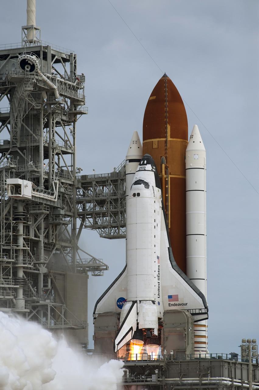 CAPE CANAVERAL, Fla. -- Space shuttle Endeavour's main engines ignite for liftoff at Launch Pad 39A at NASA's Kennedy Space Center in Florida. Endeavour began its final flight, the STS-134 mission to the International Space Station, at 8:56 a.m. EDT on May 16. Endeavour and its six-member crew will deliver the Alpha Magnetic Spectrometer-2 (AMS), Express Logistics Carrier-3, a high-pressure gas tank and additional spare parts for the Dextre robotic helper to the space station. For more information visit, www.nasa.gov/mission_pages/shuttle/shuttlemissions/sts134/index.html. Photo credit: NASA/Sandra Joseph and Kevin O'Connell