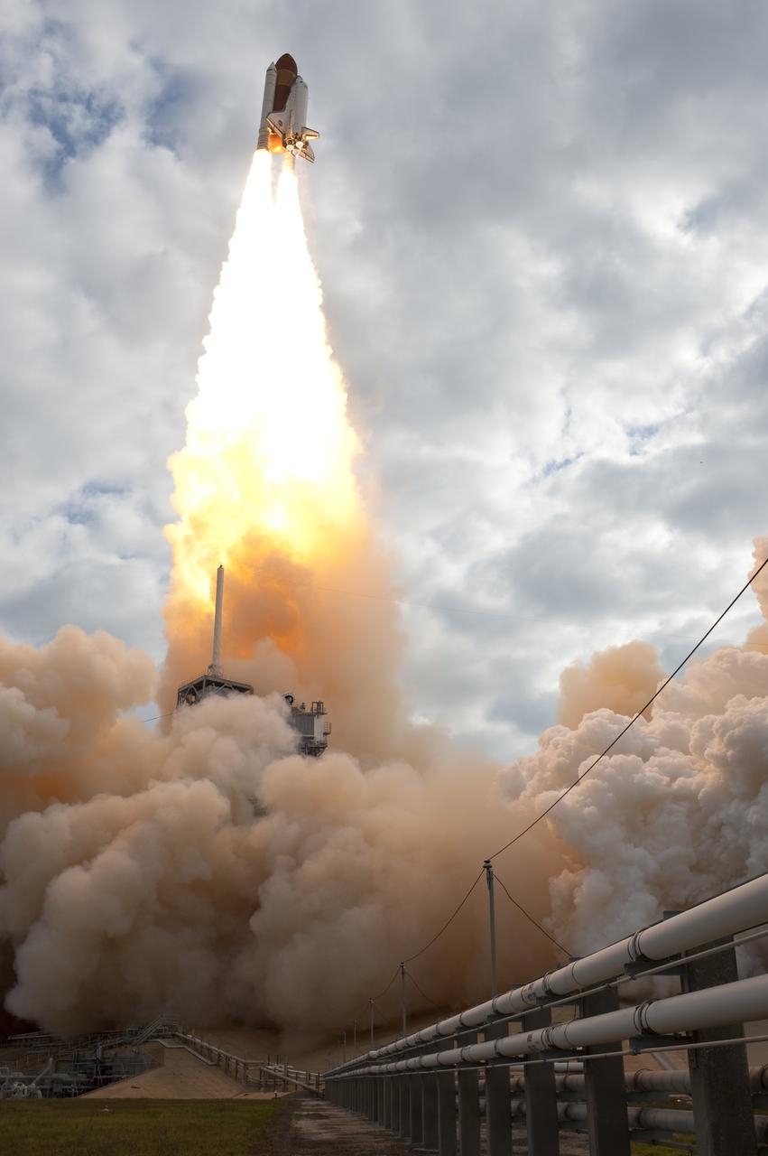 CAPE CANAVERAL, Fla. -- Rising on twin columns of fire, space shuttle Endeavour lifts off from Launch Pad 39A at NASA's Kennedy Space Center in Florida.          Endeavour began its final flight, the STS-134 mission to the International Space Station, at 8:56 a.m. EDT on May 16. Endeavour and its six-member crew will deliver the Alpha Magnetic Spectrometer-2 (AMS), Express Logistics Carrier-3, a high-pressure gas tank and additional spare parts for the Dextre robotic helper to the space station. For more information visit, www.nasa.gov/mission_pages/shuttle/shuttlemissions/sts134/index.html. Photo credit: NASA/Sandra Joseph and Kevin O'Connell
