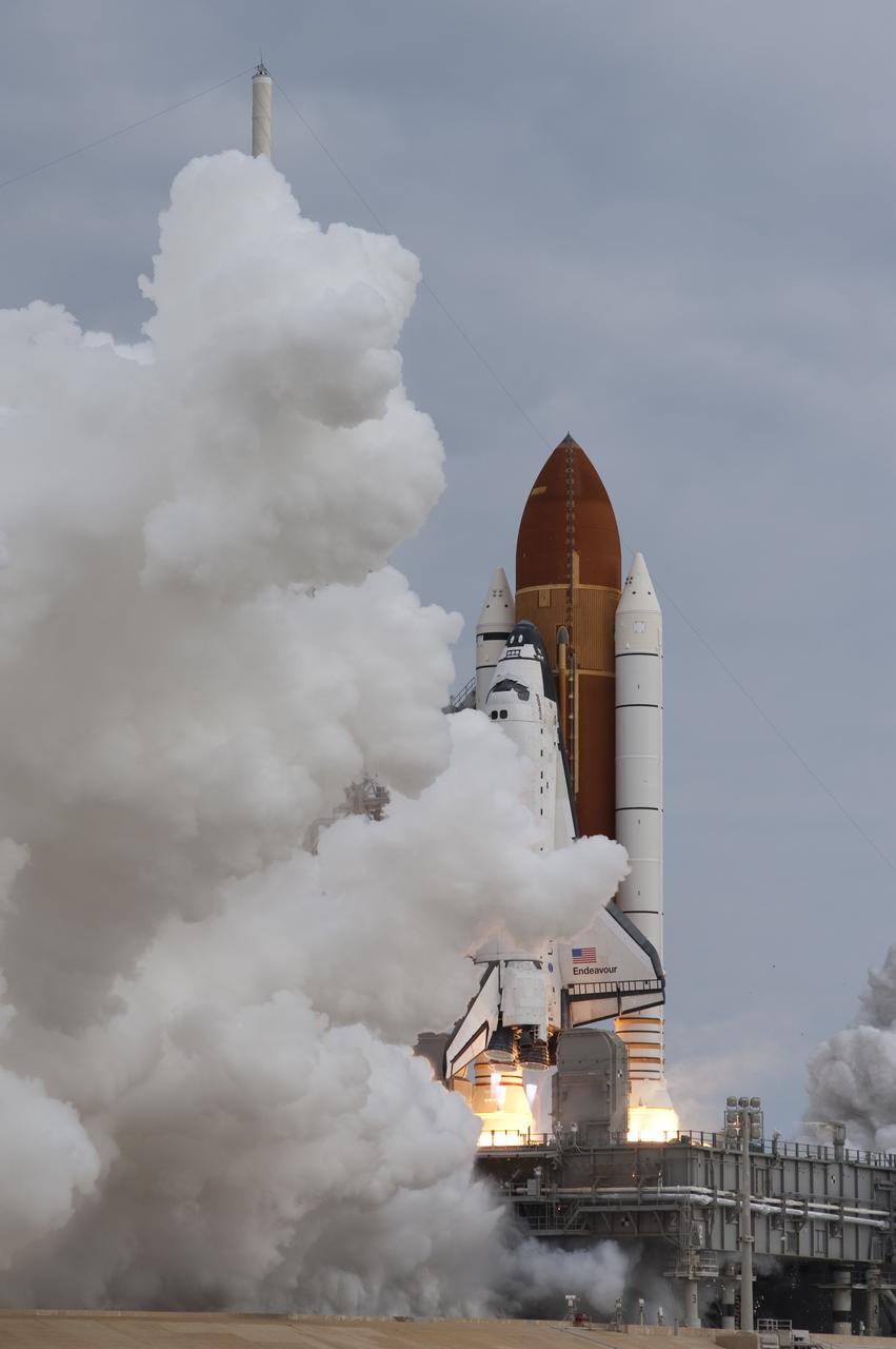 CAPE CANAVERAL, Fla. -- A cloud of steam and smoke emerge as space shuttle Endeavour's main engines ignite for liftoff at Launch Pad 39A at NASA's Kennedy Space Center in Florida. Endeavour began its final flight, the STS-134 mission to the International Space Station, at 8:56 a.m. EDT on May 16. Endeavour and its six-member crew will deliver the Alpha Magnetic Spectrometer-2 (AMS), Express Logistics Carrier-3, a high-pressure gas tank and additional spare parts for the Dextre robotic helper to the space station. For more information visit, www.nasa.gov/mission_pages/shuttle/shuttlemissions/sts134/index.html. Photo credit: NASA/Sandra Joseph and Kevin O'Connell