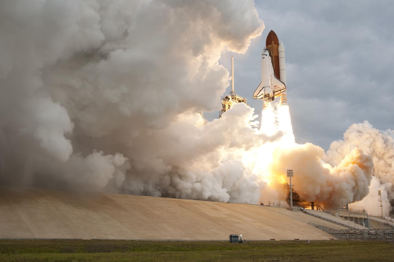 CAPE CANAVERAL, Fla. -- Space shuttle Endeavour rises through clouds of smoke and steam from Launch Pad 39A at NASA's Kennedy Space Center in Florida.        Endeavour began its final flight, the STS-134 mission to the International Space Station, at 8:56 a.m. EDT on May 16. Endeavour and its six-member crew will deliver the Alpha Magnetic Spectrometer-2 (AMS), Express Logistics Carrier-3, a high-pressure gas tank and additional spare parts for the Dextre robotic helper to the space station. For more information visit, www.nasa.gov/mission_pages/shuttle/shuttlemissions/sts134/index.html. Photo credit: NASA/Tony Gray and Tom Farrar