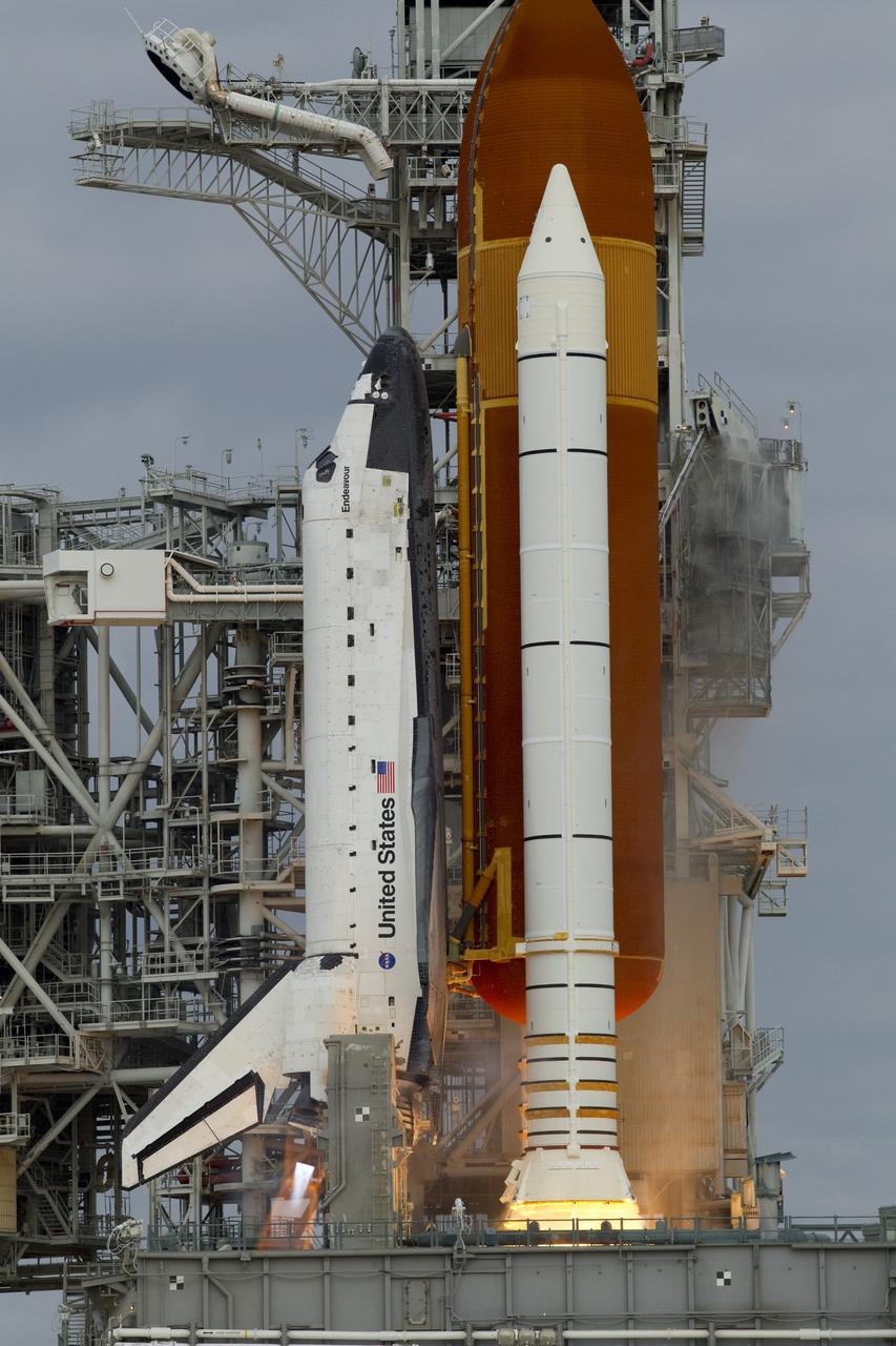 CAPE CANAVERAL, Fla. -- Space shuttle Endeavour's main engines and solid rocket boosters burst into life lifting the shuttle from Launch Pad 39A at NASA's Kennedy Space Center in Florida. Endeavour began its final flight, the STS-134 mission to the International Space Station, at 8:56 a.m. EDT on May 16. Endeavour and its six-member crew will deliver the Alpha Magnetic Spectrometer-2 (AMS), Express Logistics Carrier-3, a high-pressure gas tank and additional spare parts for the Dextre robotic helper to the space station. For more information visit, www.nasa.gov/mission_pages/shuttle/shuttlemissions/sts134/index.html. Photo credit: NASA/George Roberts and Mike Kerley
