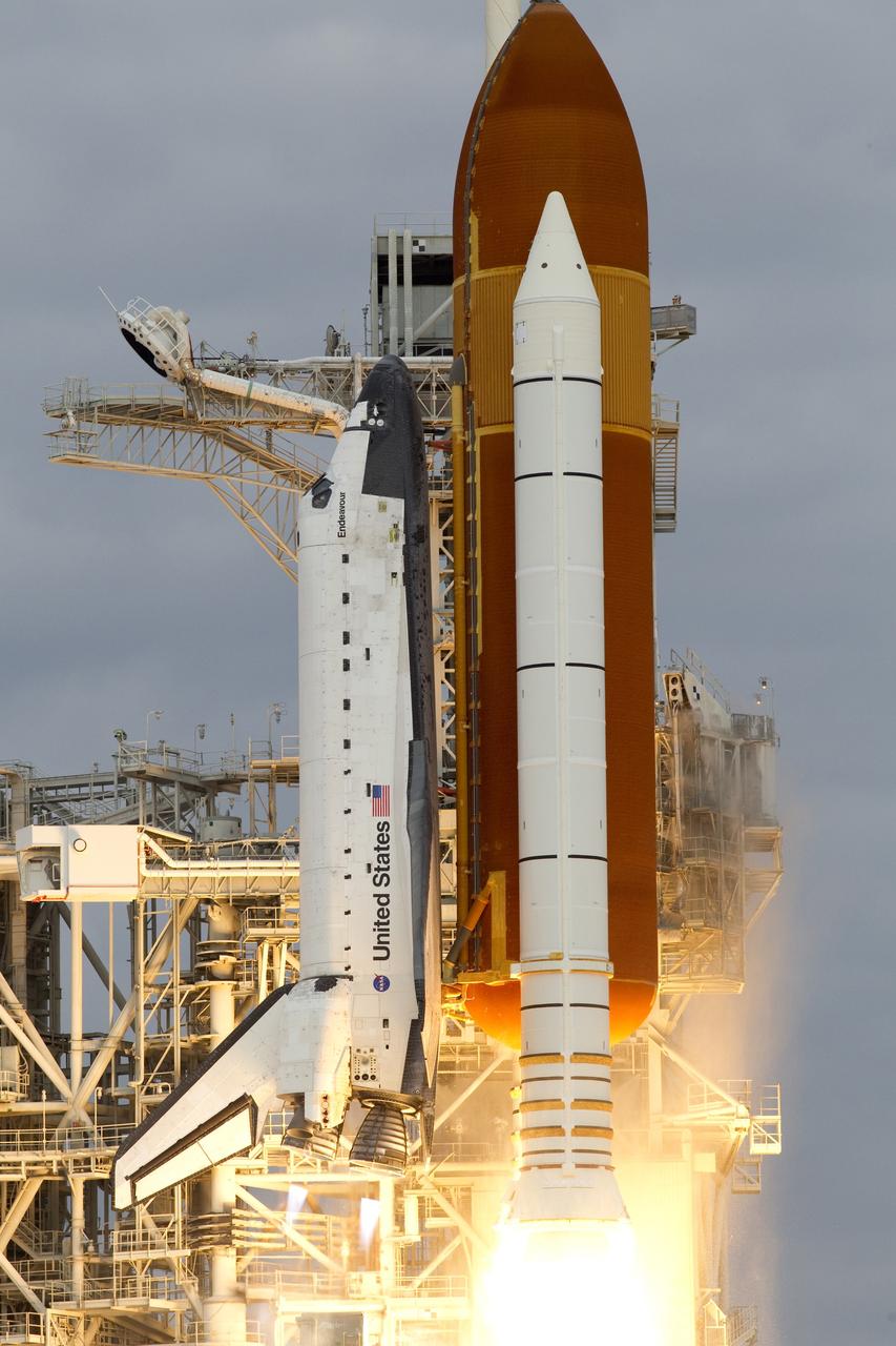 CAPE CANAVERAL, Fla. -- Space shuttle Endeavour's main engines and solid rocket boosters burst into life lifting the shuttle from Launch Pad 39A at NASA's Kennedy Space Center in Florida. Endeavour began its final flight, the STS-134 mission to the International Space Station, at 8:56 a.m. EDT on May 16. Endeavour and its six-member crew will deliver the Alpha Magnetic Spectrometer-2 (AMS), Express Logistics Carrier-3, a high-pressure gas tank and additional spare parts for the Dextre robotic helper to the space station. For more information visit, www.nasa.gov/mission_pages/shuttle/shuttlemissions/sts134/index.html. Photo credit: NASA/George Roberts and Mike Kerley