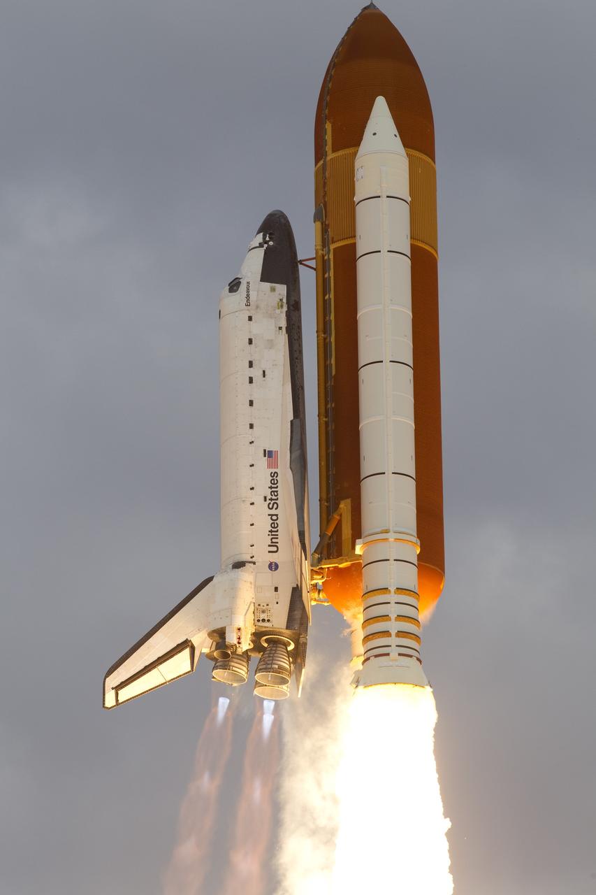 CAPE CANAVERAL, Fla. -- Space shuttle Endeavour soars toward orbit after lifting off from Launch Pad 39A at NASA's Kennedy Space Center in Florida.      Endeavour began its final flight, the STS-134 mission to the International Space Station, at 8:56 a.m. EDT on May 16. Endeavour and its six-member crew will deliver the Alpha Magnetic Spectrometer-2 (AMS), Express Logistics Carrier-3, a high-pressure gas tank and additional spare parts for the Dextre robotic helper to the space station. For more information visit, www.nasa.gov/mission_pages/shuttle/shuttlemissions/sts134/index.html. Photo credit: NASA/George Roberts and Mike Kerley