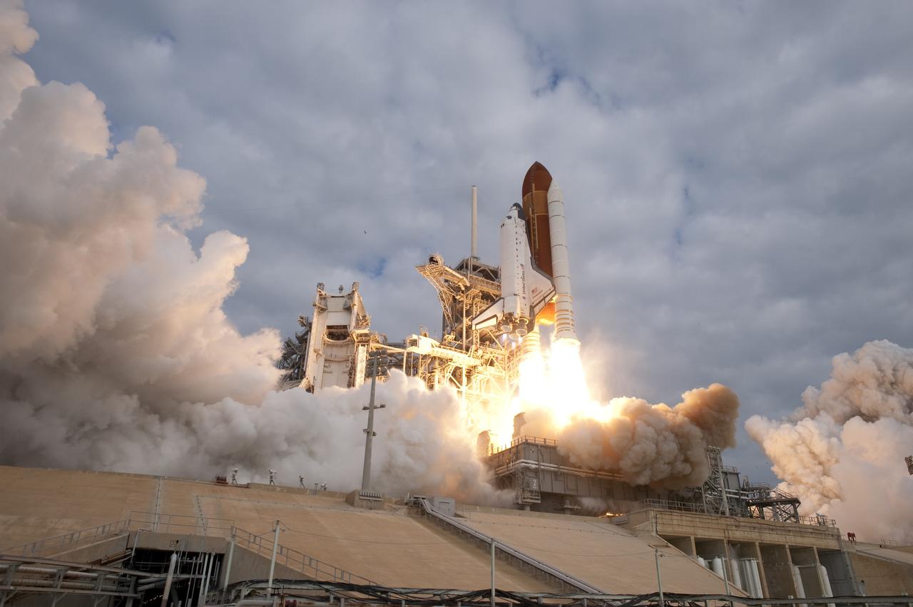 CAPE CANAVERAL, Fla. -- Space shuttle Endeavour rises through clouds of smoke and steam from Launch Pad 39A at NASA's Kennedy Space Center in Florida.        Endeavour began its final flight, the STS-134 mission to the International Space Station, at 8:56 a.m. EDT on May 16. Endeavour and its six-member crew will deliver the Alpha Magnetic Spectrometer-2 (AMS), Express Logistics Carrier-3, a high-pressure gas tank and additional spare parts for the Dextre robotic helper to the space station. For more information visit, www.nasa.gov/mission_pages/shuttle/shuttlemissions/sts134/index.html. Photo credit: NASA/Sandra Joseph and Kevin O'Connell