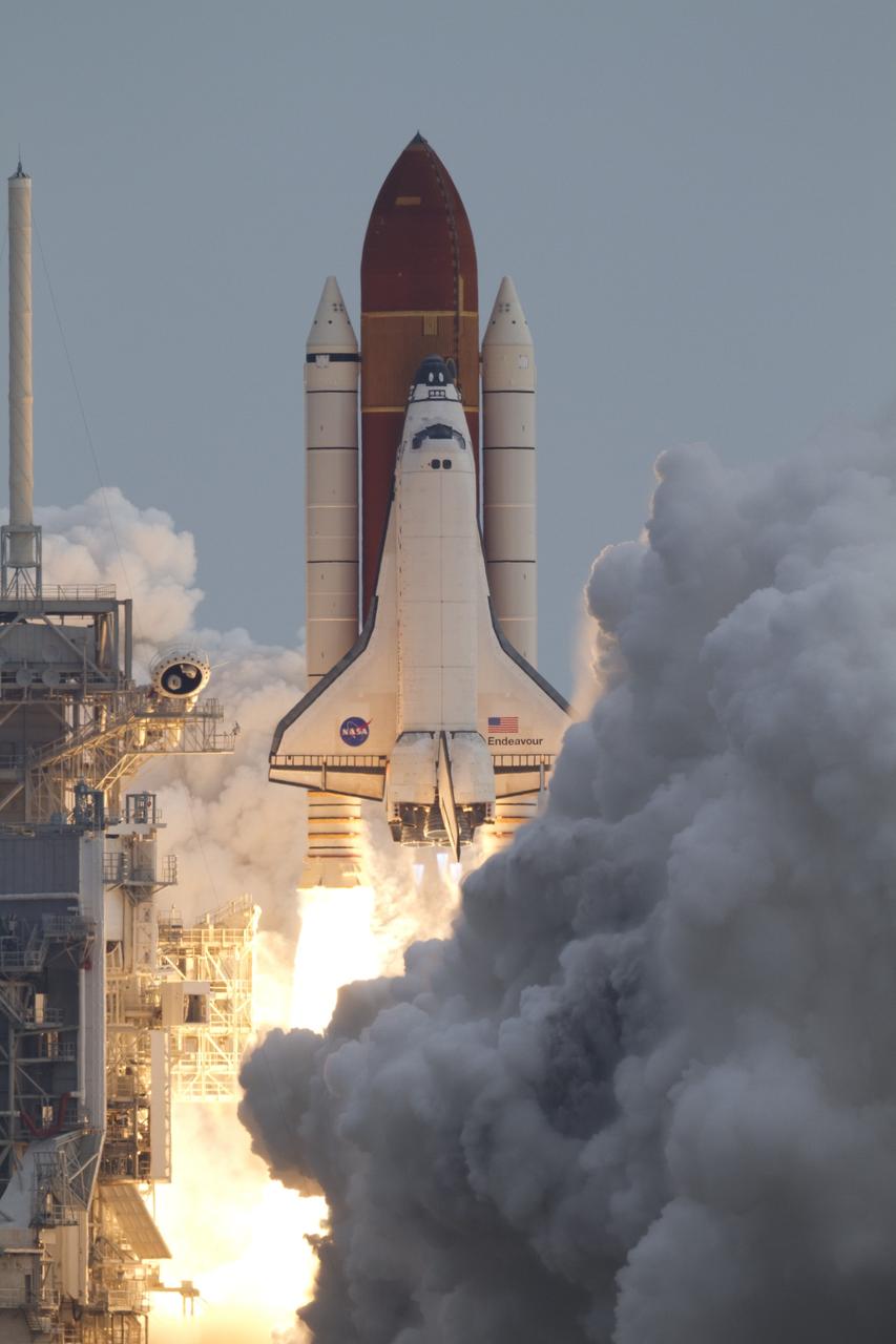 CAPE CANAVERAL, Fla. -- Space shuttle Endeavour roars through clouds of smoke and steam from Launch Pad 39A at NASA's Kennedy Space Center in Florida.      Endeavour began its final flight the STS-134 mission to the International Space Station, at 8:56 a.m. EDT on May 16. Endeavour and its six-member crew will deliver the Alpha Magnetic Spectrometer-2 (AMS), Express Logistics Carrier-3, a high-pressure gas tank and additional spare parts for the Dextre robotic helper to the space station. For more information visit, www.nasa.gov/mission_pages/shuttle/shuttlemissions/sts134/index.html. Photo credit: NASA/Kenny Allen