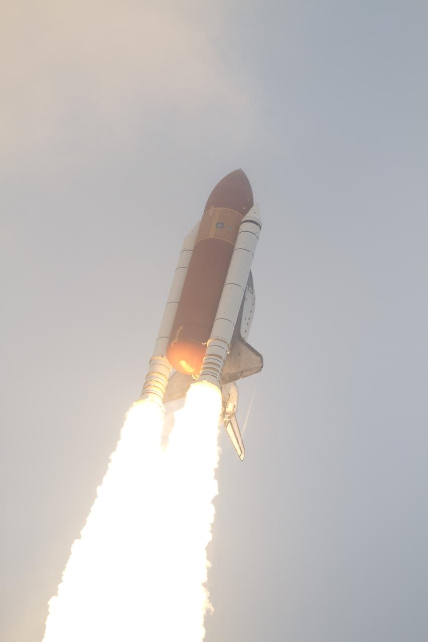 CAPE CANAVERAL, Fla. -- Space shuttle Endeavour rises on twin columns of flame from Launch Pad 39A at NASA's Kennedy Space Center in Florida.            Endeavour began its final flight, the STS-134 mission to the International Space Station, at 8:56 a.m. EDT on May 16. Endeavour and its six-member crew will deliver the Alpha Magnetic Spectrometer-2 (AMS), Express Logistics Carrier-3, a high-pressure gas tank and additional spare parts for the Dextre robotic helper to the space station. For more information visit, www.nasa.gov/mission_pages/shuttle/shuttlemissions/sts134/index.html. Photo credit: NASA/Kenny Allen