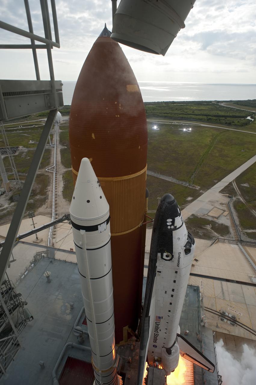 CAPE CANAVERAL, Fla. -- Space shuttle Endeavour's main engines and solid rocket boosters burst to life lifting the shuttle from Launch Pad 39A at NASA's Kennedy Space Center in Florida. Endeavour began its final flight, the STS-134 mission to the International Space Station, at 8:56 a.m. EDT on May 16. Endeavour and its six-member crew will deliver the Alpha Magnetic Spectrometer-2 (AMS), Express Logistics Carrier-3, a high-pressure gas tank and additional spare parts for the Dextre robotic helper to the space station. For more information visit, www.nasa.gov/mission_pages/shuttle/shuttlemissions/sts134/index.html. Photo credit: NASA/Tony Gray and Tom Farrar