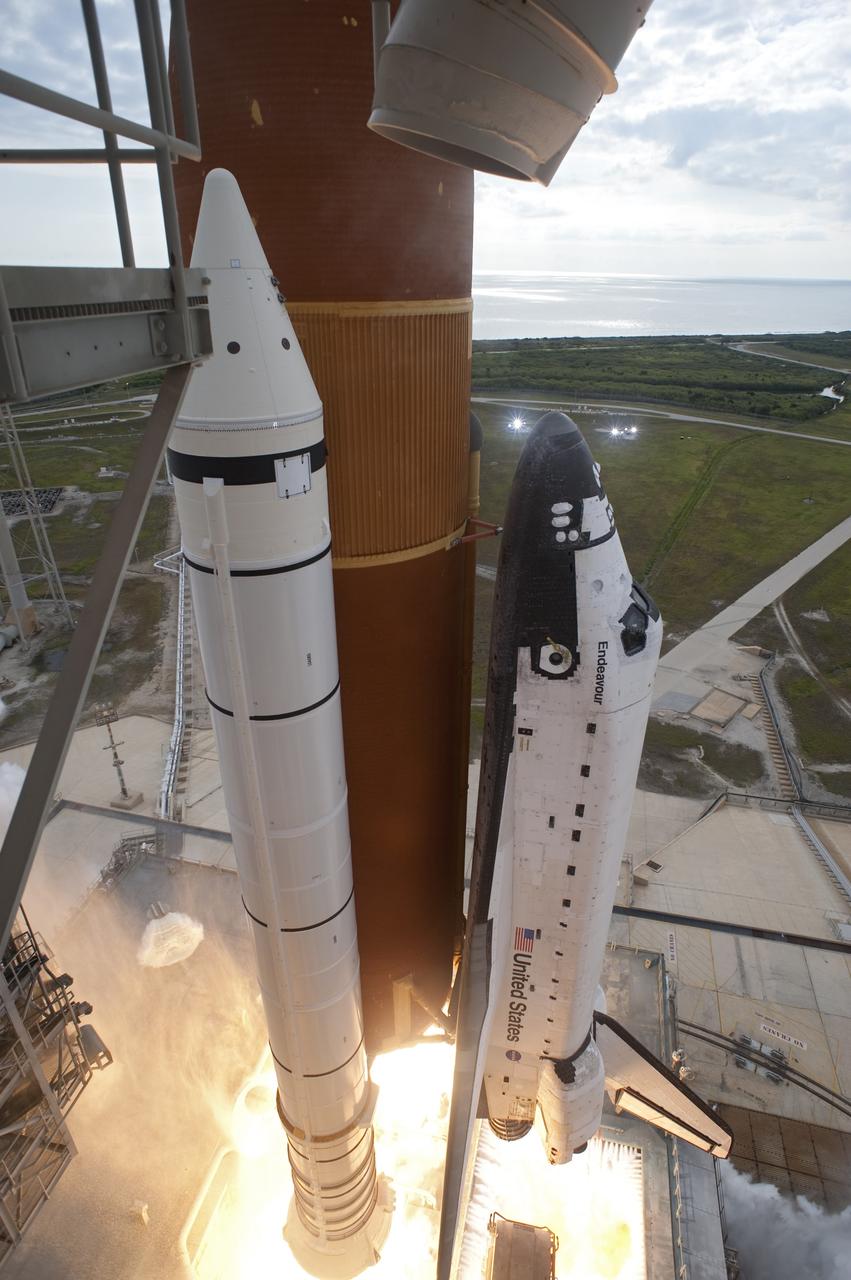 CAPE CANAVERAL, Fla. -- Space shuttle Endeavour's main engines and solid rocket boosters burst to life lifting the shuttle from Launch Pad 39A at NASA's Kennedy Space Center in Florida. Endeavour began its final flight, the STS-134 mission to the International Space Station, at 8:56 a.m. EDT on May 16. Endeavour and its six-member crew will deliver the Alpha Magnetic Spectrometer-2 (AMS), Express Logistics Carrier-3, a high-pressure gas tank and additional spare parts for the Dextre robotic helper to the space station. For more information visit, www.nasa.gov/mission_pages/shuttle/shuttlemissions/sts134/index.html. Photo credit: NASA/Tony Gray and Tom Farrar