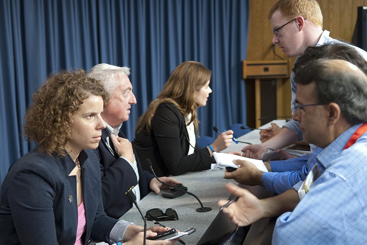 CAPE CANAVERAL, Fla. -- In the Press Site auditorium at NASA's Kennedy Space Center in Florida, staff for U.S. Congresswoman Gabielle Giffords brief media after the successful launch of space shuttle Endeavour on its STS-134 mission. From left are, Pia Carusone Chief of Staff,  U.S. Rep. Gabrielle Giffords Office, Mark Kimble Press Advisor, U.S. Rep. Gabrielle Giffords Office and Ashley Nash-Hahn, New Media Strategist, U.S. Rep. Gabrielle Giffords Office.   Giffords was on hand to watch her husband, STS-135 Commander Mark Kelly and his crew liftoff from Launch Pad 39A on Endeavour's final spaceflight.      Endeavour lifted off May 16 at 8:56 a.m. EDT. Endeavour and its crew will deliver the Express Logistics Carrier-3, Alpha Magnetic Spectrometer-2 (AMS), a high-pressure gas tank and additional spare parts for the Dextre robotic helper to the station. For more information visit, www.nasa.gov/mission_pages/shuttle/shuttlemissions/sts134/index.html. Photo credit: NASA/Jim Grossmann