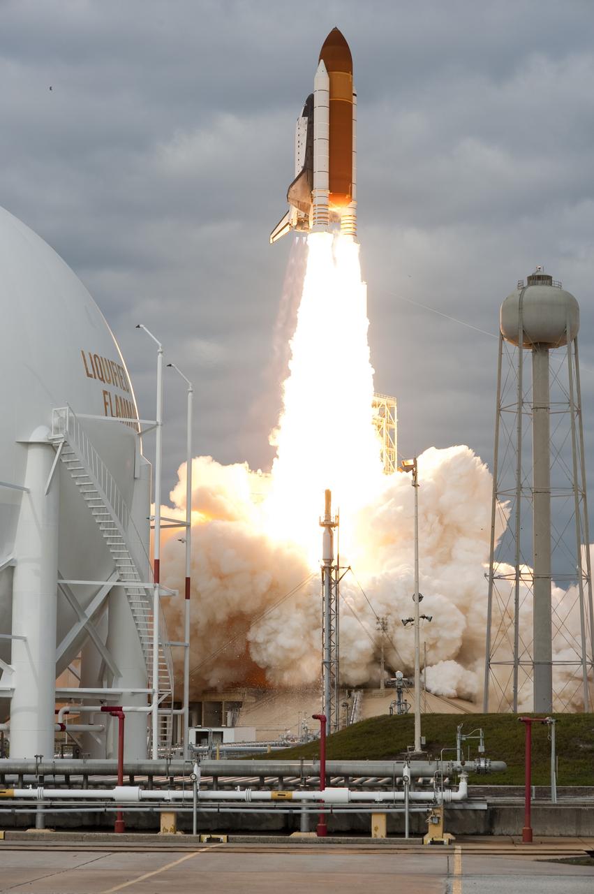 CAPE CANAVERAL, Fla. -- Space shuttle Endeavour rises on twin columns of flame and clears the tower at Launch Pad 39A at NASA's Kennedy Space Center in Florida.        Endeavour began its final flight, the STS-134 mission to the International Space Station, at 8:56 a.m. EDT on May 16. Endeavour and its six-member crew will deliver the Alpha Magnetic Spectrometer-2 (AMS), Express Logistics Carrier-3, a high-pressure gas tank and additional spare parts for the Dextre robotic helper to the space station. For more information visit, www.nasa.gov/mission_pages/shuttle/shuttlemissions/sts134/index.html. Photo credit: NASA/Tony Gray and Tom Farrar