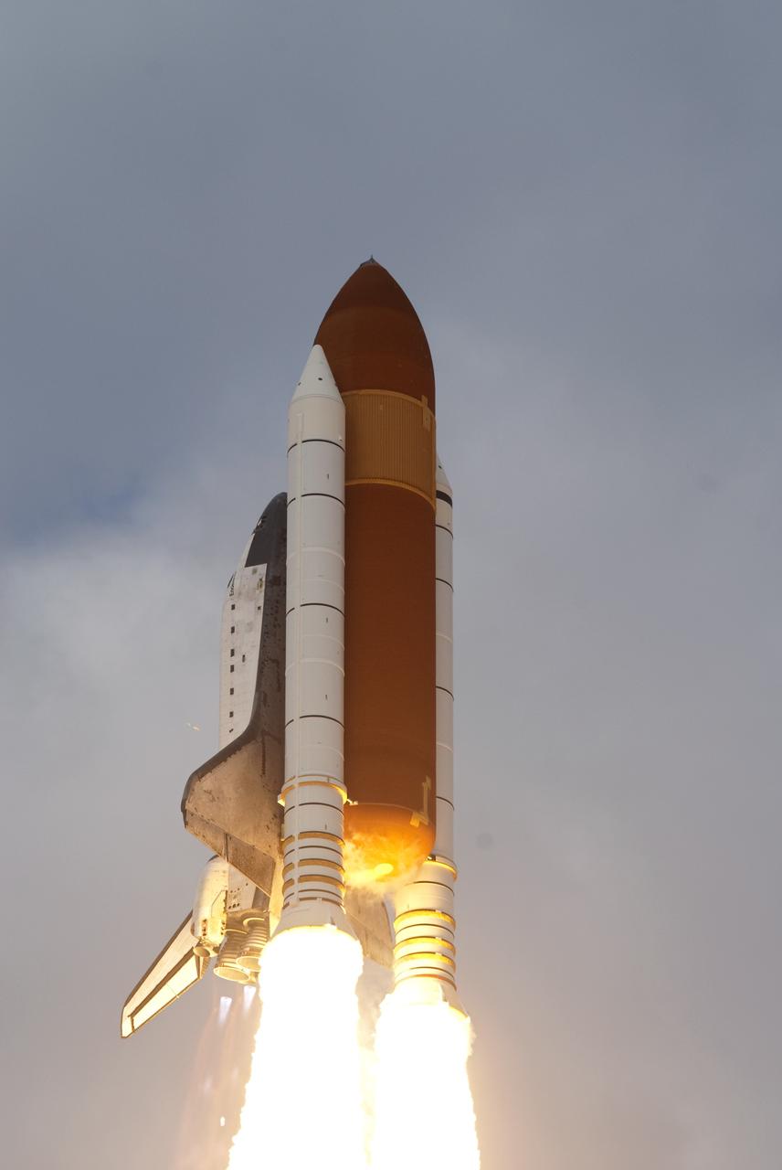 CAPE CANAVERAL, Fla. -- Space shuttle Endeavour soars toward orbit after lifting off from Launch Pad 39A at NASA's Kennedy Space Center in Florida.        Endeavour began its final flight, the STS-134 mission to the International Space Station, at 8:56 a.m. EDT on May 16. Endeavour and its six-member crew will deliver the Alpha Magnetic Spectrometer-2 (AMS), Express Logistics Carrier-3, a high-pressure gas tank and additional spare parts for the Dextre robotic helper to the space station. For more information visit, www.nasa.gov/mission_pages/shuttle/shuttlemissions/sts134/index.html. Photo credit: NASA/Rusty Backer and Mike Gayle