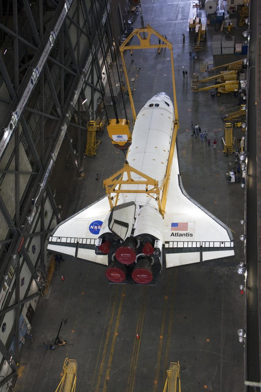 CAPE CANAVERAL, Fla. -- In the Vehicle Assembly Building at NASA's Kennedy Space Center in Florida, shuttle Atlantis is ready to be lifted by an overhead crane and moved into a high bay where it will be attached to its external fuel tank and solid rocket boosters already on the mobile launcher platform. Commander Chris Ferguson, Pilot Doug Hurley and Mission Specialists Sandra Magnus and Rex Walheim are expected to launch in mid-July, taking with them the Raffaello multi-purpose logistics module packed with supplies, logistics and spare parts. The STS-135 mission also will fly a system to investigate the potential for robotically refueling existing spacecraft and return a failed ammonia pump module to help NASA better understand the failure mechanism and improve pump designs for future systems. STS-135 will be the 33rd flight of Atlantis, the 37th shuttle mission to the space station, and the 135th and final mission of NASA's Space Shuttle Program. For more information visit, www.nasa.gov/mission_pages/shuttle/shuttlemissions/sts135/index.html. Photo credit: NASA/Ken Thornsley