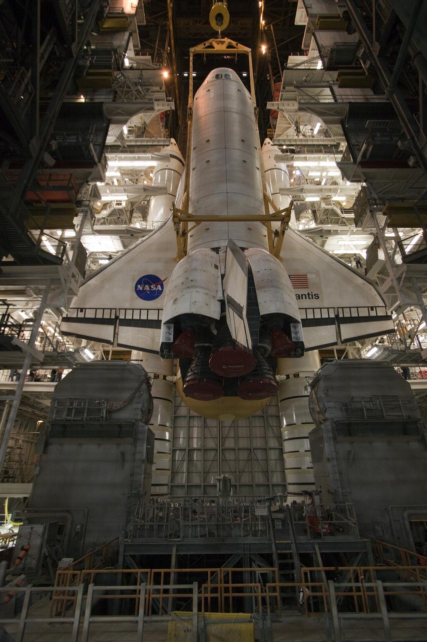 CAPE CANAVERAL, Fla. -- In the Vehicle Assembly Building at NASA's Kennedy Space Center in Florida, shuttle Atlantis is lowered onto the mobile launcher platform where it will be joined with its external fuel tank and solid rocket boosters. Commander Chris Ferguson, Pilot Doug Hurley and Mission Specialists Sandra Magnus and Rex Walheim are expected to launch in mid-July, taking with them the Raffaello multi-purpose logistics module packed with supplies, logistics and spare parts. The STS-135 mission also will fly a system to investigate the potential for robotically refueling existing spacecraft and return a failed ammonia pump module to help NASA better understand the failure mechanism and improve pump designs for future systems. STS-135 will be the 33rd flight of Atlantis, the 37th shuttle mission to the space station, and the 135th and final mission of NASA's Space Shuttle Program. For more information visit, www.nasa.gov/mission_pages/shuttle/shuttlemissions/sts135/index.html. Photo credit: NASA/Troy Cryder