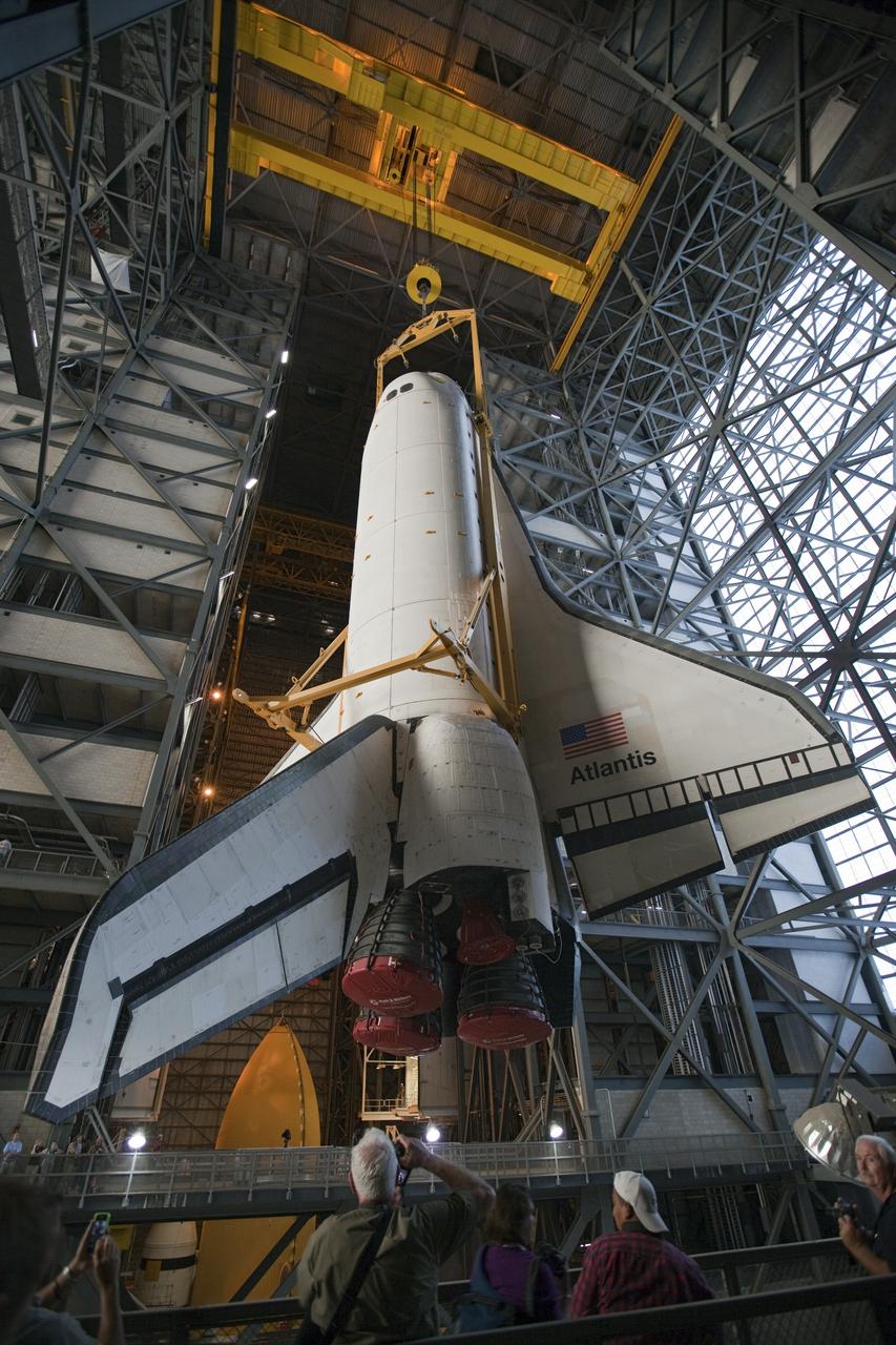 CAPE CANAVERAL, Fla. -- In the Vehicle Assembly Building at NASA's Kennedy Space Center in Florida, shuttle Atlantis is lifted by an overhead crane and moved into a high bay where it will be attached to its external fuel tank and solid rocket boosters which are already on the mobile launcher platform. Commander Chris Ferguson, Pilot Doug Hurley and Mission Specialists Sandra Magnus and Rex Walheim are expected to launch in mid-July, taking with them the Raffaello multi-purpose logistics module packed with supplies, logistics and spare parts. The STS-135 mission also will fly a system to investigate the potential for robotically refueling existing spacecraft and return a failed ammonia pump module to help NASA better understand the failure mechanism and improve pump designs for future systems. STS-135 will be the 33rd flight of Atlantis, the 37th shuttle mission to the space station, and the 135th and final mission of NASA's Space Shuttle Program. For more information visit, www.nasa.gov/mission_pages/shuttle/shuttlemissions/sts135/index.html. Photo credit: NASA/Dimitri Gerondidakis