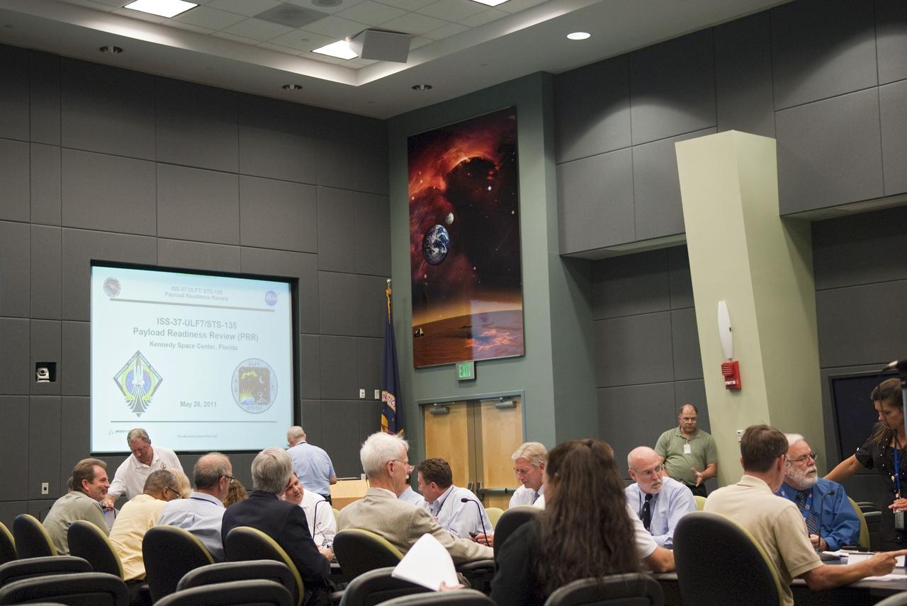 Cape Canaveral, Fla. -- NASA managers meet in Operations Support Building II at NASA's Kennedy Space Center to discuss the readiness of the payload for shuttle Atlantis' STS-135 mission to the International Space Station. Just before a payload is installed in the shuttle's payload bay, a Payload Readiness Review is held at Kennedy. This review, one of the last in a long process, assesses the readiness of the shuttle and the payload for what are called the "payload on-line integration activities." The last major cargo/shuttle review prior to launch is the Flight Readiness Review which verifies that all integration operations have been completed satisfactorily and gives final certification that the flight elements are ready to go.            Commander Chris Ferguson, Pilot Doug Hurley and Mission Specialists Sandra Magnus and Rex Walheim are targeted to launch on July 8, taking with them the Raffaello multi-purpose logistics module packed with supplies, logistics and spare parts. The STS-135 mission also will fly a system to investigate the potential for robotically refueling existing spacecraft and return a failed ammonia pump module to help NASA better understand the failure mechanism and improve pump designs for future systems. STS-135 will be the 33rd flight of Atlantis, the 37th shuttle mission to the space station, and the 135th and final mission of NASA's Space Shuttle Program. For more information visit, www.nasa.gov/mission_pages/shuttle/shuttlemissions/sts135/index.html. Photo credit: NASA/Jim Grossmann
