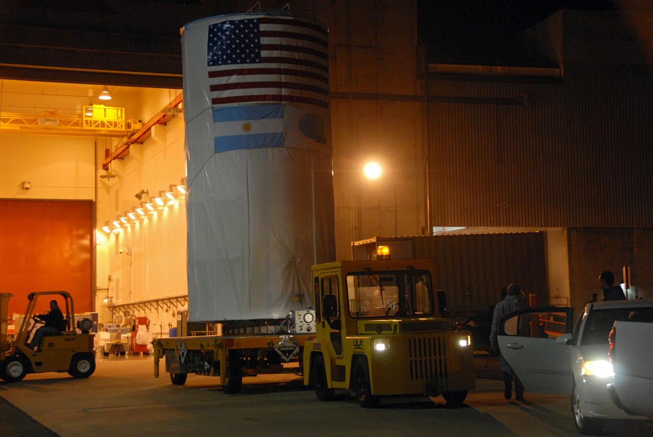 VANDENBERG AIR FORCE BASE, Calif. -- The Aquarius/SAC-D spacecraft, secured inside its payload transportation canister, is being transferred to NASA's Space Launch Complex-2 (SLC-2) at Vandenberg Air Force Base in California.         There, the spacecraft will be integrated to a United Launch Alliance Delta II rocket in preparation for the targeted June liftoff. Aquarius, the NASA-built instrument on the SAC-D spacecraft, will provide new insights into how variations in ocean surface salinity relate to fundamental climate processes on its three-year mission. Photo credit: NASA/VAFB