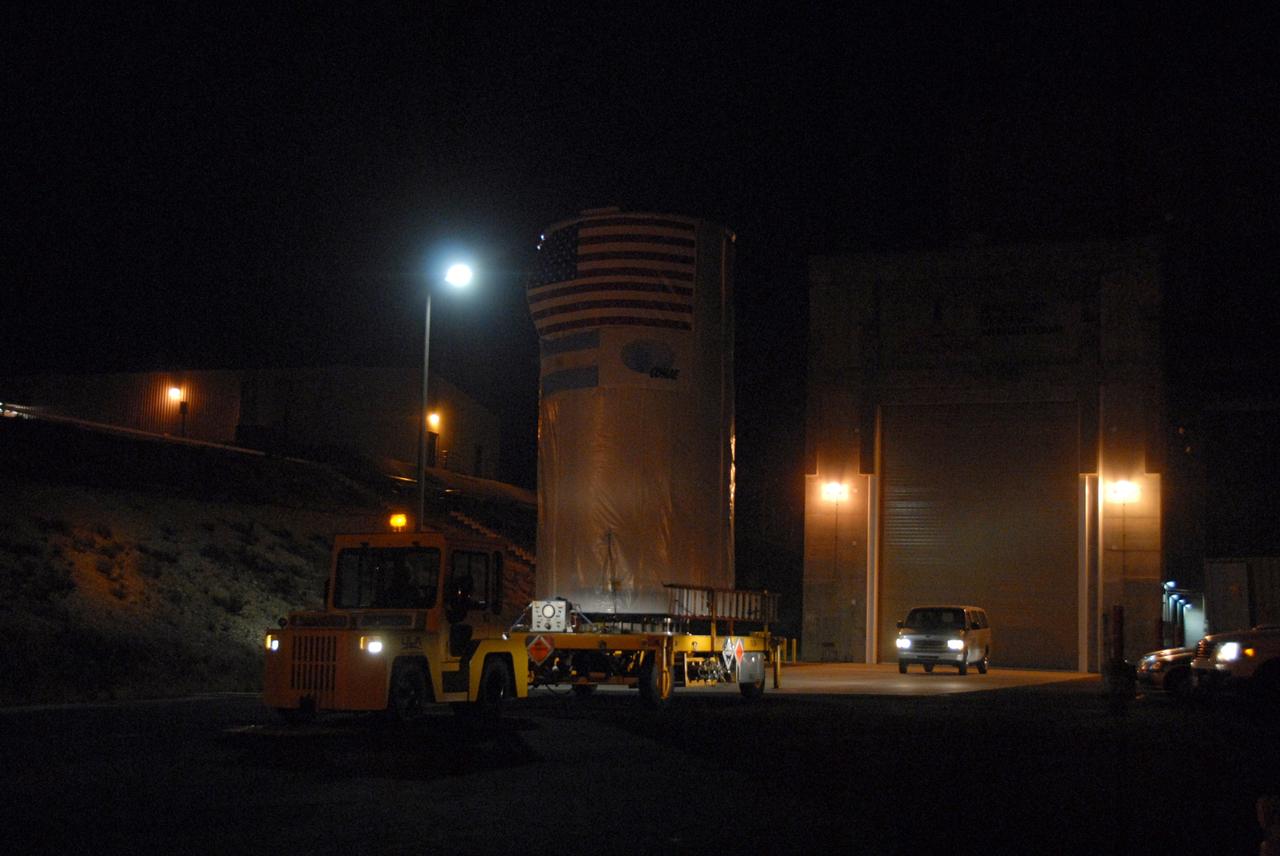 VANDENBERG AIR FORCE BASE, Calif. -- At Vandenberg Air Force Base in California, NASA's Aquarius/SAC-D spacecraft, secured inside its payload transportation canister, is being transferred to Space Launch Complex-2.            There, the spacecraft will be integrated to a United Launch Alliance Delta II rocket in preparation for the targeted June liftoff. Aquarius, the NASA-built primary instrument on the SAC-D spacecraft, will provide new insights into how variations in ocean surface salinity relate to fundamental climate processes on its three-year mission. Photo credit: NASA/VAFB