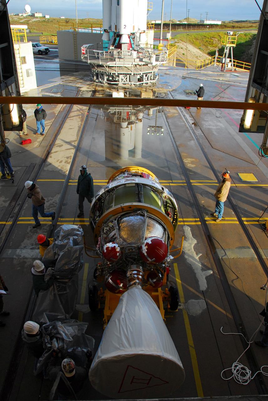 VANDENBERG AIR FORCE BASE, Calif. -- Workers prepare the United Launch Alliance Delta II second stage motor for lifting into the service tower at NASA's Space Launch Complex-2 (SLC-2) at Vandenberg Air Force Base in California.              Following final tests, the Aquarius/SAC-D spacecraft will be integrated to the Delta II launch vehicle in preparation for the targeted June liftoff. Aquarius, the NASA-built instrument on the SAC-D spacecraft will provide new insights into how variations in ocean surface salinity relate to fundamental climate processes on its three-year mission. Photo credit: NASA/VAFB
