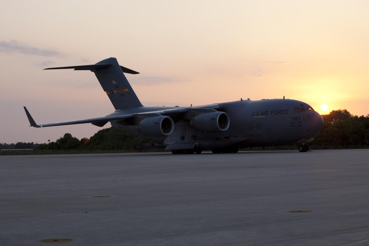 CAPE CANAVERAL, Fla. -- An Air Force C-17 cargo plane arrives on the Shuttle Landing Facility at NASA's Kennedy Space Center in Florida carrying the space agency's Gravity Recovery and Interior Laboratory, or GRAIL, spacecraft. The spacecraft traveled from the Lockheed Martin plant in Denver, Colo., and will undergo further processing in the Astrotech payload processing facility in Titusville, Fla. The United Launch Alliance Delta II rocket that will carry GRAIL into lunar orbit already is fully stacked at NASA's Space Launch Complex 17B and launch is scheduled for Sept. 8. The GRAIL mission is a part of NASA's Discovery Program. GRAIL will fly twin spacecraft in tandem orbits around the moon for several months to measure its gravity field. The mission also will answer longstanding questions about Earth's moon and provide scientists a better understanding of how Earth and other rocky planets in the solar system formed. For more information, visit http://science.nasa.gov/missions/grail/. Photo credit: NASA/Dimitri Gerondidakis