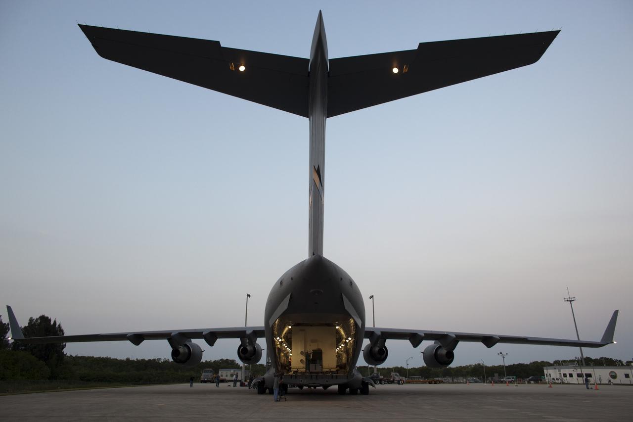 CAPE CANAVERAL, Fla. -- NASA's Gravity Recovery and Interior Laboratory, or GRAIL, spacecraft will be offloaded from an Air Force C-17 cargo plane on the Shuttle Landing Facility at Kennedy Space Center in Florida. The spacecraft traveled from the Lockheed Martin plant in Denver, Colo., and will undergo further processing in the Astrotech payload processing facility in Titusville, Fla. The United Launch Alliance Delta II rocket that will carry GRAIL into lunar orbit already is fully stacked at NASA's Space Launch Complex 17B and launch is scheduled for Sept. 8. The GRAIL mission is a part of NASA's Discovery Program. GRAIL will fly twin spacecraft in tandem orbits around the moon for several months to measure its gravity field. The mission also will answer longstanding questions about Earth's moon and provide scientists a better understanding of how Earth and other rocky planets in the solar system formed. For more information, visit http://science.nasa.gov/missions/grail/. Photo credit: NASA/Dimitri Gerondidakis