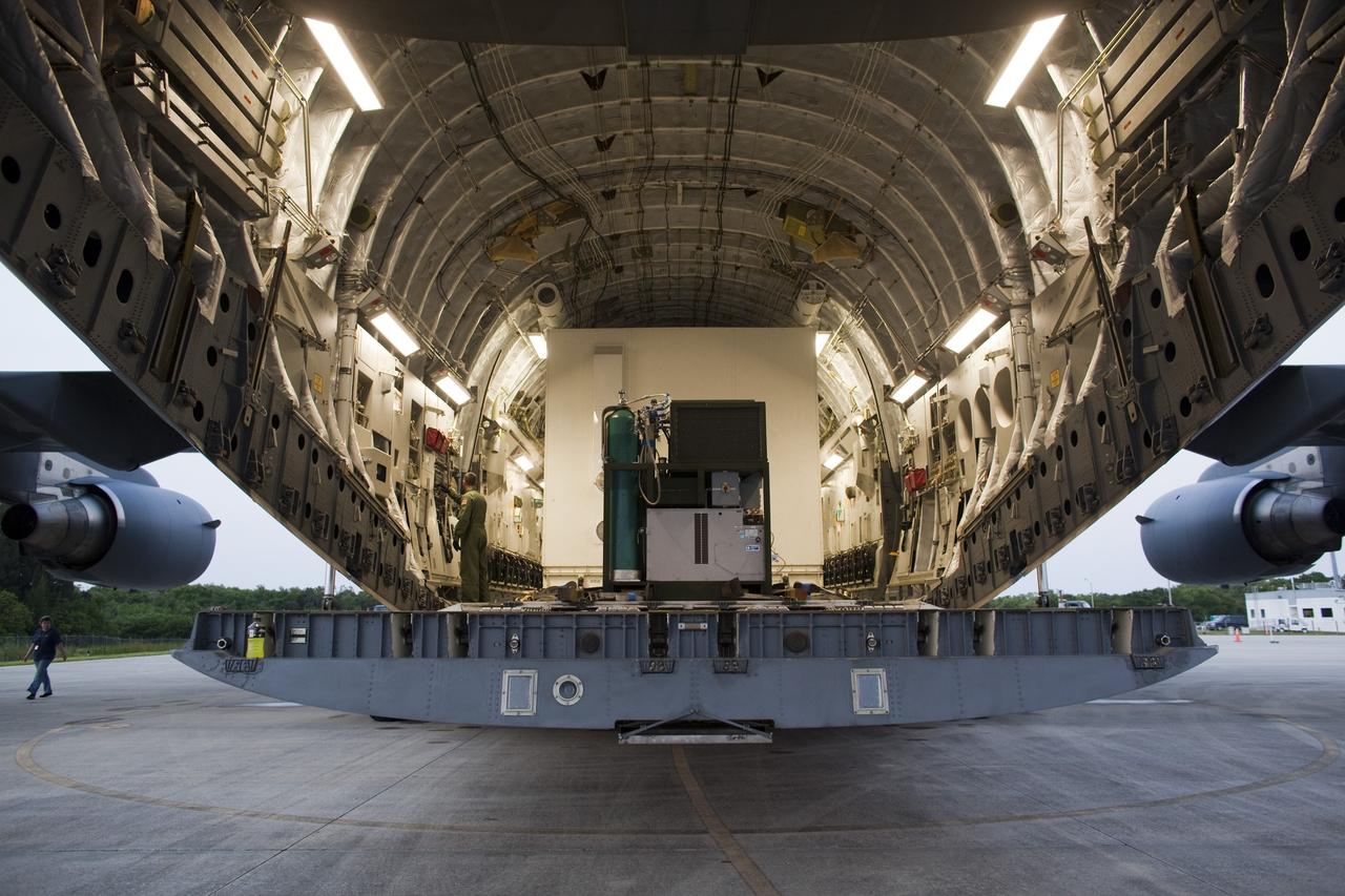 CAPE CANAVERAL, Fla. -- NASA's Gravity Recovery and Interior Laboratory, or GRAIL, spacecraft will be offloaded from an Air Force C-17 cargo plane on the Shuttle Landing Facility at Kennedy Space Center in Florida. The spacecraft traveled from the Lockheed Martin plant in Denver, Colo., and will undergo further processing in the Astrotech payload processing facility in Titusville, Fla. The United Launch Alliance Delta II rocket that will carry GRAIL into lunar orbit already is fully stacked at NASA's Space Launch Complex 17B and launch is scheduled for Sept. 8. The GRAIL mission is a part of NASA's Discovery Program. GRAIL will fly twin spacecraft in tandem orbits around the moon for several months to measure its gravity field. The mission also will answer longstanding questions about Earth's moon and provide scientists a better understanding of how Earth and other rocky planets in the solar system formed. For more information, visit http://science.nasa.gov/missions/grail/. Photo credit: NASA/Dimitri Gerondidakis