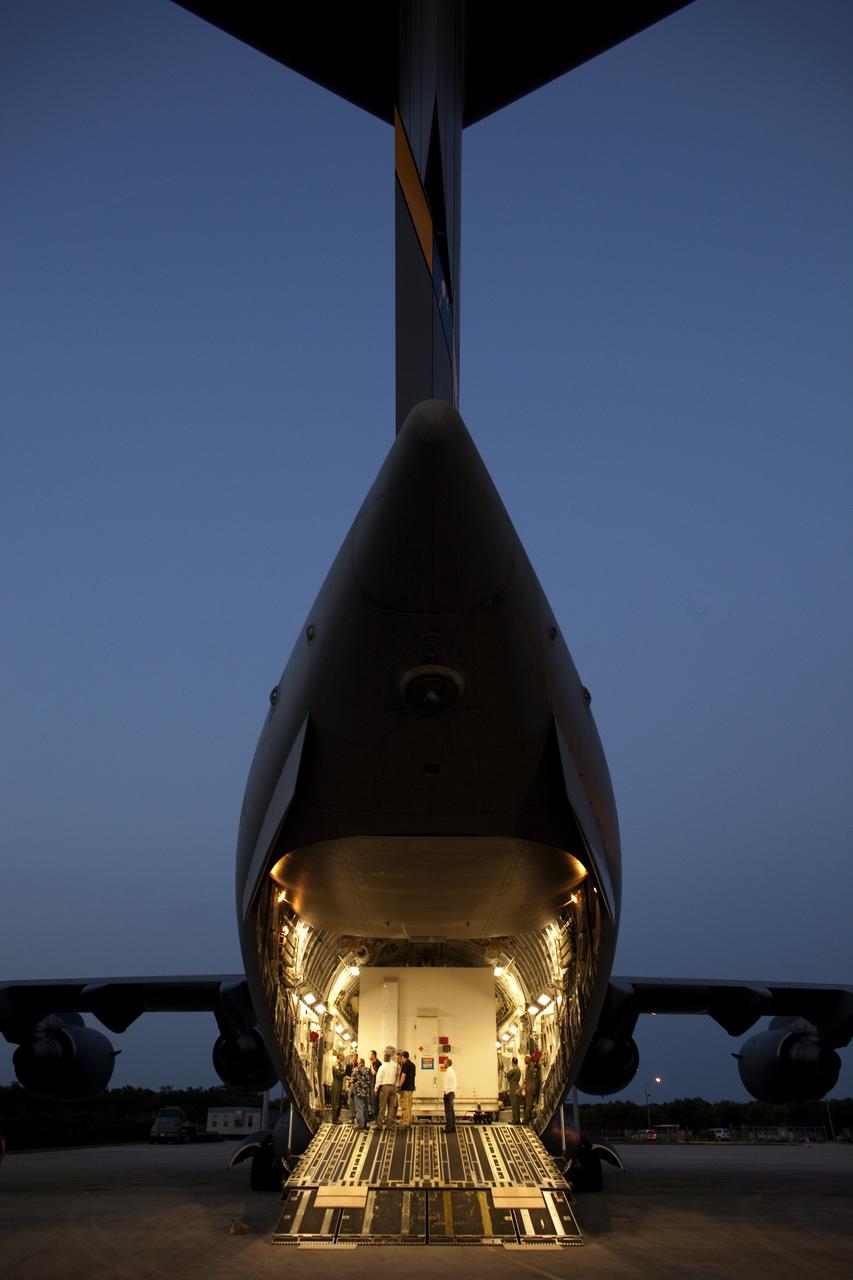 CAPE CANAVERAL, Fla. -- NASA's Gravity Recovery and Interior Laboratory, or GRAIL, spacecraft will be offloaded from an Air Force C-17 cargo plane on the Shuttle Landing Facility at Kennedy Space Center in Florida. The spacecraft traveled from the Lockheed Martin plant in Denver, Colo., and will undergo further processing in the Astrotech payload processing facility in Titusville, Fla. The United Launch Alliance Delta II rocket that will carry GRAIL into lunar orbit already is fully stacked at NASA's Space Launch Complex 17B and launch is scheduled for Sept. 8. The GRAIL mission is a part of NASA's Discovery Program. GRAIL will fly twin spacecraft in tandem orbits around the moon for several months to measure its gravity field. The mission also will answer longstanding questions about Earth's moon and provide scientists a better understanding of how Earth and other rocky planets in the solar system formed. For more information, visit http://science.nasa.gov/missions/grail/. Photo credit: NASA/Dimitri Gerondidakis