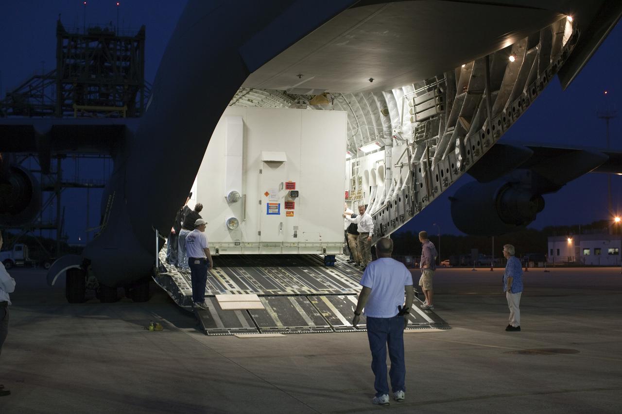 CAPE CANAVERAL, Fla. -- NASA's Gravity Recovery and Interior Laboratory, or GRAIL, spacecraft is offloaded from an Air Force C-17 cargo plane on the Shuttle Landing Facility at Kennedy Space Center in Florida. The spacecraft traveled from the Lockheed Martin plant in Denver, Colo., and will undergo further processing in the Astrotech payload processing facility in Titusville, Fla. The United Launch Alliance Delta II rocket that will carry GRAIL into lunar orbit already is fully stacked at NASA's Space Launch Complex 17B and launch is scheduled for Sept. 8. The GRAIL mission is a part of NASA's Discovery Program. GRAIL will fly twin spacecraft in tandem orbits around the moon for several months to measure its gravity field. The mission also will answer longstanding questions about Earth's moon and provide scientists a better understanding of how Earth and other rocky planets in the solar system formed. For more information, visit http://science.nasa.gov/missions/grail/. Photo credit: NASA/Dimitri Gerondidakis
