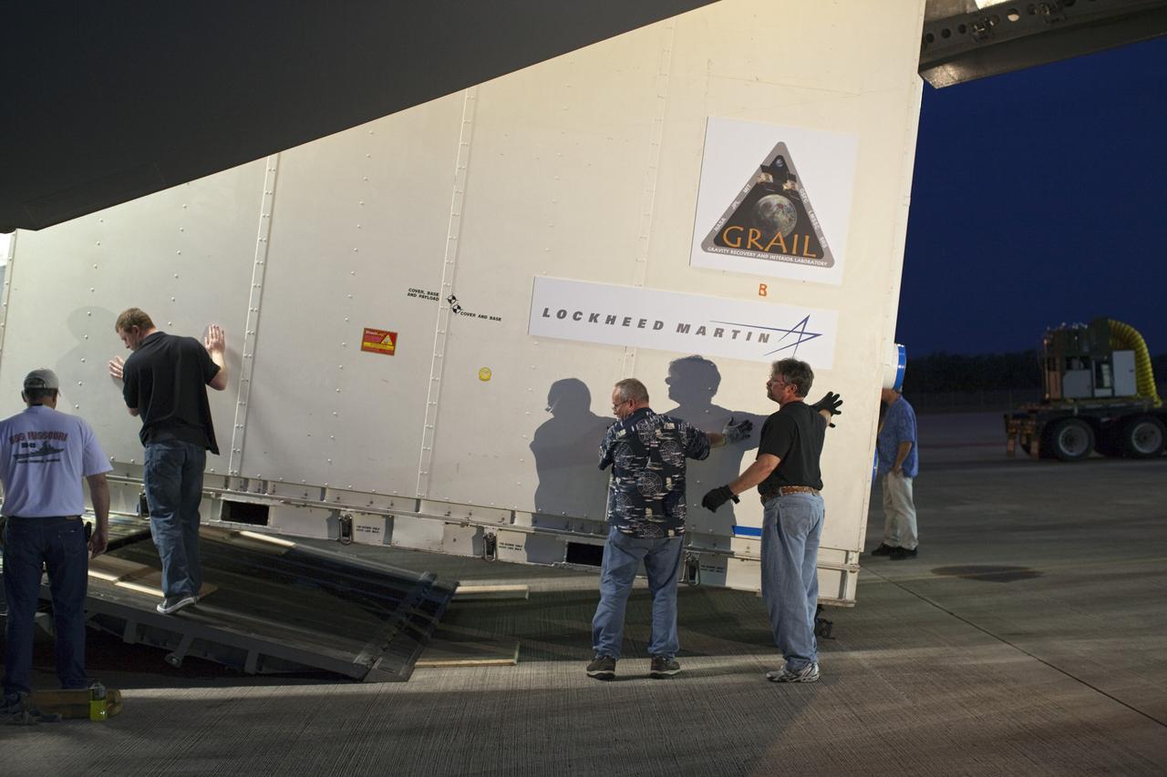 CAPE CANAVERAL, Fla. -- NASA's Gravity Recovery and Interior Laboratory, or GRAIL, spacecraft is offloaded from an Air Force C-17 cargo plane on the Shuttle Landing Facility at Kennedy Space Center in Florida. The spacecraft traveled from the Lockheed Martin plant in Denver, Colo., and will undergo further processing in the Astrotech payload processing facility in Titusville, Fla. The United Launch Alliance Delta II rocket that will carry GRAIL into lunar orbit already is fully stacked at NASA's Space Launch Complex 17B and launch is scheduled for Sept. 8. The GRAIL mission is a part of NASA's Discovery Program. GRAIL will fly twin spacecraft in tandem orbits around the moon for several months to measure its gravity field. The mission also will answer longstanding questions about Earth's moon and provide scientists a better understanding of how Earth and other rocky planets in the solar system formed. For more information, visit http://science.nasa.gov/missions/grail/. Photo credit: NASA/Dimitri Gerondidakis