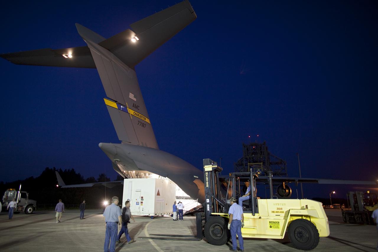 CAPE CANAVERAL, Fla. -- NASA's Gravity Recovery and Interior Laboratory, or GRAIL, spacecraft is offloaded from an Air Force C-17 cargo plane on the Shuttle Landing Facility at Kennedy Space Center in Florida. The spacecraft traveled from the Lockheed Martin plant in Denver, Colo., and will undergo further processing in the Astrotech payload processing facility in Titusville, Fla. The United Launch Alliance Delta II rocket that will carry GRAIL into lunar orbit already is fully stacked at NASA's Space Launch Complex 17B and launch is scheduled for Sept. 8. The GRAIL mission is a part of NASA's Discovery Program. GRAIL will fly twin spacecraft in tandem orbits around the moon for several months to measure its gravity field. The mission also will answer longstanding questions about Earth's moon and provide scientists a better understanding of how Earth and other rocky planets in the solar system formed. For more information, visit http://science.nasa.gov/missions/grail/. Photo credit: NASA/Dimitri Gerondidakis