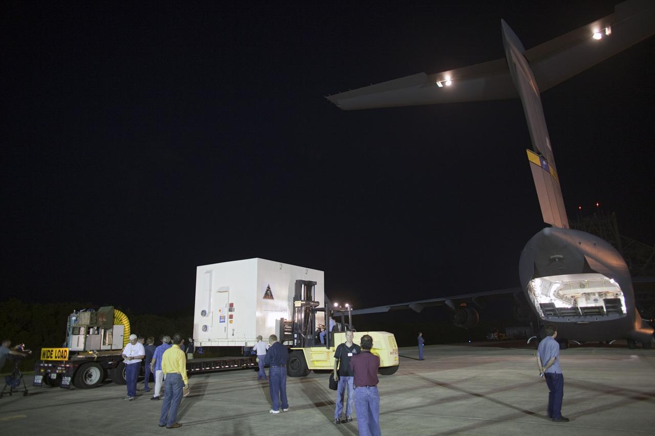 CAPE CANAVERAL, Fla. -- NASA's Gravity Recovery and Interior Laboratory, or GRAIL, spacecraft is loaded onto a tractor-trailer for transport to the Astrotech payload processing facility in Titusville, Fla., where it will be processed for launch. An Air Force C-17 cargo plane flew the spacecraft from the Lockheed Martin plant in Denver, Colo., to the Shuttle Landing Facility at Kennedy Space Center in Florida. The United Launch Alliance Delta II rocket that will carry GRAIL into lunar orbit already is fully stacked at NASA's Space Launch Complex 17B and launch is scheduled for Sept. 8. The GRAIL mission is a part of NASA's Discovery Program. GRAIL will fly twin spacecraft in tandem orbits around the moon for several months to measure its gravity field. The mission also will answer longstanding questions about Earth's moon and provide scientists a better understanding of how Earth and other rocky planets in the solar system formed. For more information, visit http://science.nasa.gov/missions/grail/. Photo credit: NASA/Dimitri Gerondidakis