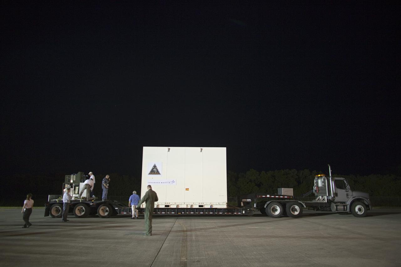 CAPE CANAVERAL, Fla. -- A tractor-trailer will transport NASA's Gravity Recovery and Interior Laboratory, or GRAIL, spacecraft to the Astrotech payload processing facility in Titusville, Fla., where it will be processed for launch. An Air Force C-17 cargo plane flew the spacecraft from the Lockheed Martin plant in Denver, Colo., to the Shuttle Landing Facility at Kennedy Space Center in Florida. The United Launch Alliance Delta II rocket that will carry GRAIL into lunar orbit already is fully stacked at NASA's Space Launch Complex 17B and launch is scheduled for Sept. 8. The GRAIL mission is a part of NASA's Discovery Program. GRAIL will fly twin spacecraft in tandem orbits around the moon for several months to measure its gravity field. The mission also will answer longstanding questions about Earth's moon and provide scientists a better understanding of how Earth and other rocky planets in the solar system formed. For more information, visit http://science.nasa.gov/missions/grail/. Photo credit: NASA/Dimitri Gerondidakis