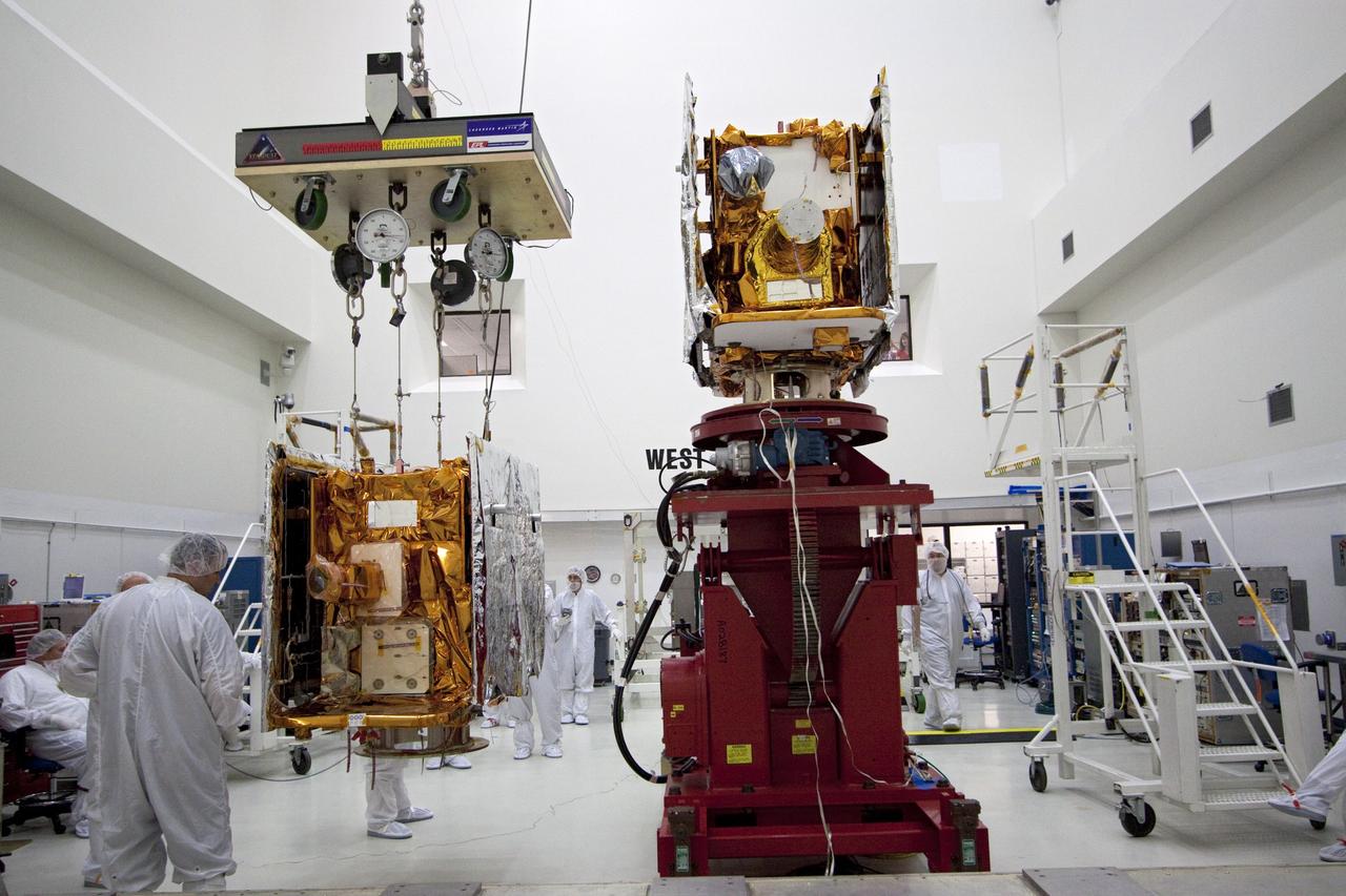 CAPE CANAVERAL, Fla. -- Technicians lift one of two spacecraft for NASA's Gravity Recovery and Interior Laboratory, or GRAIL, to a test stand in the Astrotech payload processing facility in Titusville, Fla. The twin spacecraft were built at the Lockheed Martin plant in Denver, Colo. The United Launch Alliance Delta II rocket that will carry GRAIL into lunar orbit already is fully stacked at NASA's Space Launch Complex 17B and launch is scheduled for Sept. 8. The GRAIL mission is a part of NASA's Discovery Program. GRAIL will fly twin spacecraft in tandem orbits around the moon for several months to measure its gravity field. The mission also will answer longstanding questions about Earth's moon and provide scientists a better understanding of how Earth and other rocky planets in the solar system formed. For more information, visit http://science.nasa.gov/missions/grail/. Photo credit: NASA/Jack Pfaller