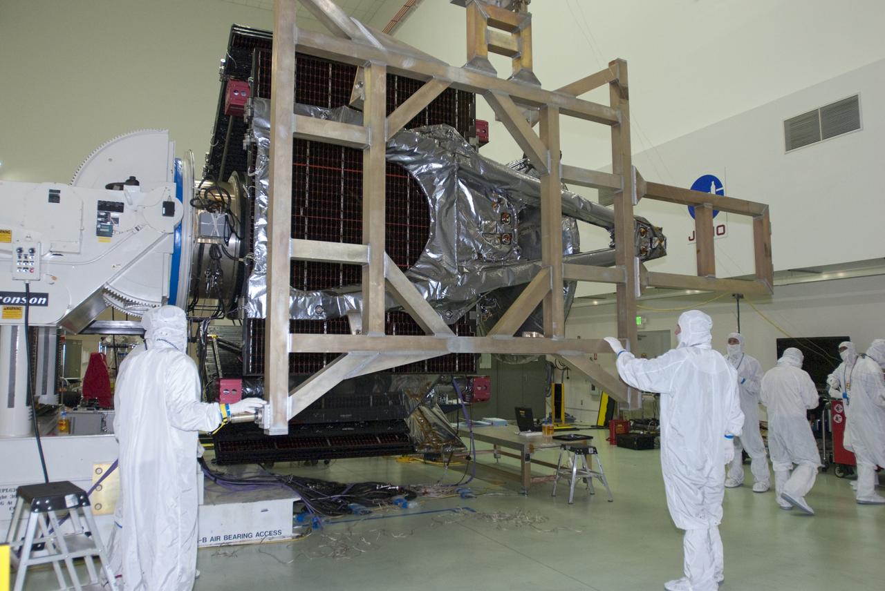 CAPE CANAVERAL, Fla. -- At Astrotech Space Operations in Titusville, Fla., technicians have installed a solar array #1 with its magnetometer boom to NASA's Juno spacecraft.          Juno is scheduled to launch aboard a United Launch Alliance Atlas V rocket from Cape Canaveral, Fla. Aug. 5.The solar-powered spacecraft will orbit Jupiter's poles 33 times to find out more about the gas giant's origins, structure, atmosphere and magnetosphere and investigate the existence of a solid planetary core. For more information visit: www.nasa.gov/juno. Photo credit: NASA/Charisse Nahser