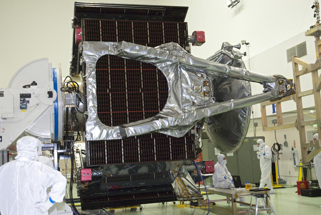 CAPE CANAVERAL, Fla. -- At Astrotech Space Operations in Titusville, Fla., technicians have installed solar array #1 with its magnetometer boom to NASA's Juno spacecraft.          Juno is scheduled to launch aboard a United Launch Alliance Atlas V rocket from Cape Canaveral, Fla. Aug. 5.The solar-powered spacecraft will orbit Jupiter's poles 33 times to find out more about the gas giant's origins, structure, atmosphere and magnetosphere and investigate the existence of a solid planetary core. For more information visit: www.nasa.gov/juno. Photo credit: NASA/Charisse Nahser