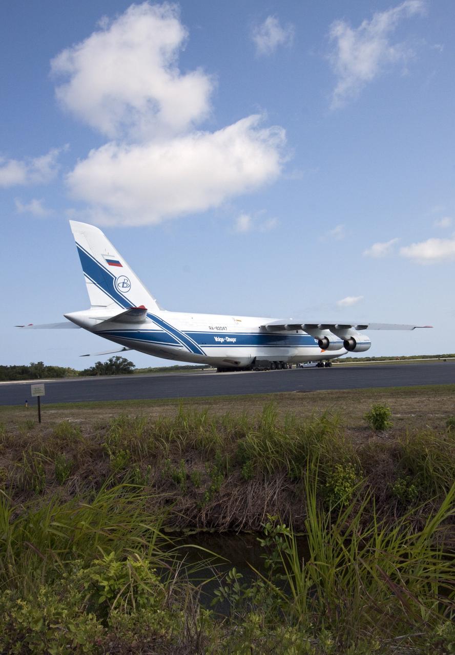CAPE CANAVERAL, Fla. -- At Cape Canaveral Air Force Station in Florida, a Volga-Dnepr Antonov AN-124-100, Ukranian/Russian cargo aircraft has landed on the Skid Strip. The aircraft is delivering the Centaur upper stage of a United Launch Alliance Atlas V rocket.            NASA's Juno spacecraft is scheduled to launch aboard the Atlas V from Cape Canaveral, Fla. Aug. 5.The solar-powered spacecraft will orbit Jupiter's poles 33 times to find out more about the gas giant's origins, structure, atmosphere and magnetosphere and investigate the existence of a solid planetary core. For more information visit: www.nasa.gov/juno. Photo credit: NASA/Jack Pfaller