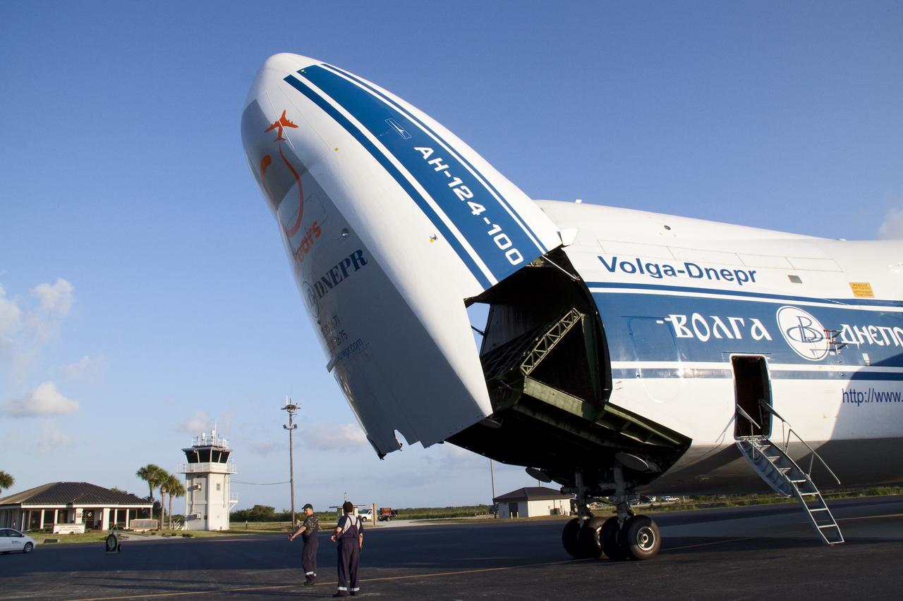 CAPE CANAVERAL, Fla. -- On the Skid Strip at Cape Canaveral Air Force Station in Florida, workers prepare to unload a Volga-Dnepr Antonov AN-124-100, a Ukranian/Russian cargo aircraft that has delivered the Centaur upper stage of the United Launch Alliance Atlas V rocket slated to launch NASA's Juno spacecraft.    NASA's Juno spacecraft is scheduled to launch aboard the Atlas V from Cape Canaveral, Fla. Aug. 5.The solar-powered spacecraft will orbit Jupiter's poles 33 times to find out more about the gas giant's origins, structure, atmosphere and magnetosphere and investigate the existence of a solid planetary core. For more information visit: www.nasa.gov/juno. Photo credit: NASA/Jack Pfaller