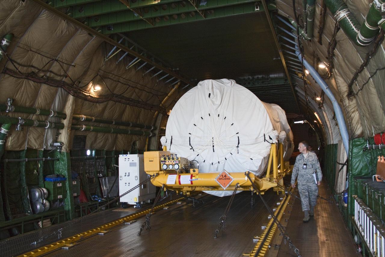 CAPE CANAVERAL, Fla. -- On the Skid Strip at Cape Canaveral Air Force Station in Florida, workers prepare to unload a Volga-Dnepr Antonov AN-124-100, a Ukranian/Russian cargo aircraft that has delivered the Centaur upper stage of the United Launch Alliance Atlas V rocket slated to launch NASA's Juno spacecraft. NASA's Juno spacecraft is scheduled to launch aboard the Atlas V from Cape Canaveral, Fla. Aug. 5.The solar-powered spacecraft will orbit Jupiter's poles 33 times to find out more about the gas giant's origins, structure, atmosphere and magnetosphere and investigate the existence of a solid planetary core. For more information visit: www.nasa.gov/juno. Photo credit: NASA/Jack Pfaller
