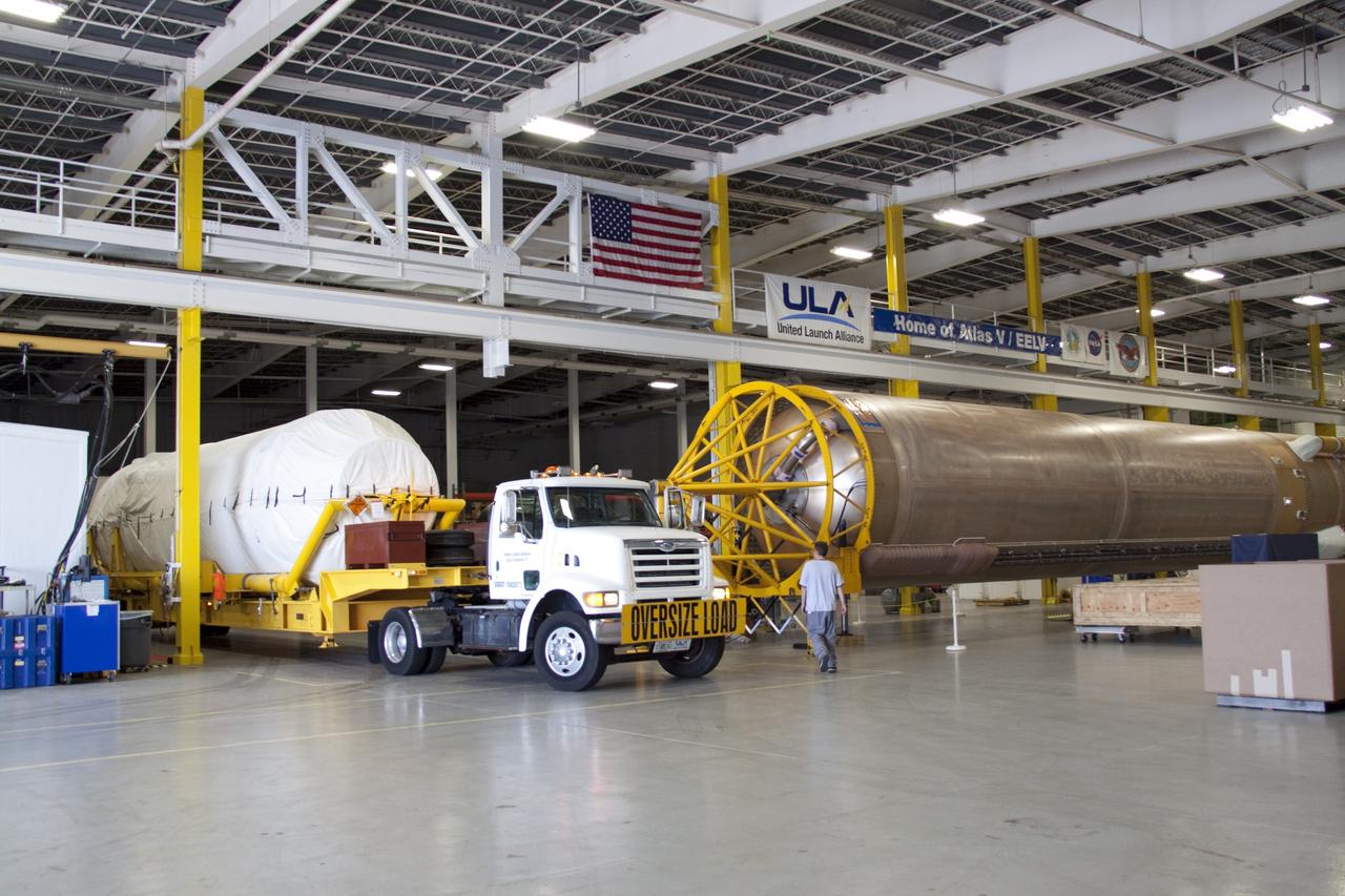 CAPE CANAVERAL, Fla. -- The Centaur upper stage for the United Launch Alliance Atlas V rocket slated to launch NASA's Juno spacecraft has been delivered to the Atlas Spaceflight Operations Center.        NASA's Juno spacecraft is scheduled to launch aboard the Atlas V from Cape Canaveral, Fla. Aug. 5.The solar-powered spacecraft will orbit Jupiter's poles 33 times to find out more about the gas giant's origins, structure, atmosphere and magnetosphere and investigate the existence of a solid planetary core. For more information visit: www.nasa.gov/juno. Photo credit: NASA/Jack Pfaller